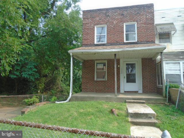 End Unit Row home in Curtis Bay offers 3 bedrooms and full bath. Open floor plan on main level . Full basement is unfinished with level walk out to fenced rear yard. Upper level has 3 bedrooms and full bath. Close to schools and shopping. Easy access to Ritchie Hwy, Tunnel and downtown. Agents please see agent remarks and all documents on this listing for contract information .