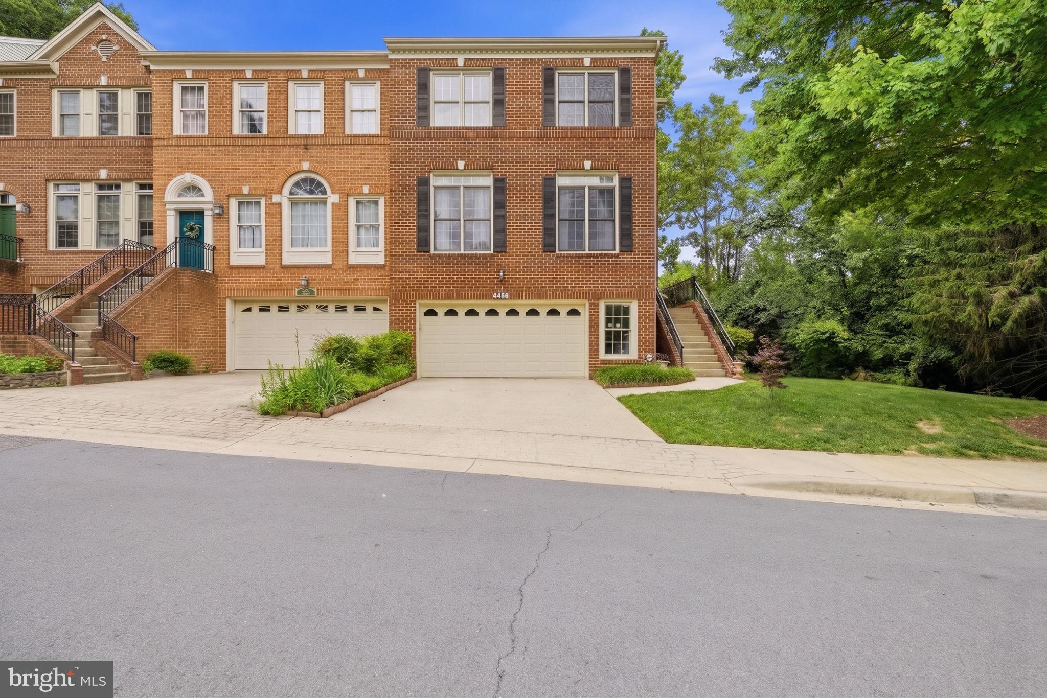 Rare opportunity in one of West Rockville's most quietly held communities. 103 Crofton Hill Lane is an end-unit brick townhome on an 8,015-square-foot lot,  more than three times the size of typical townhouse lots in the area, and provides well over 2,500 square feet of finished living space, feeding into the Lakewood Elementary, Robert Frost Middle, and Thomas S. Wootton High pyramid, one of Montgomery County's most sought-after school chains. The home has been thoughtfully updated and is move-in ready. The kitchen has been fully replaced with new shaker-style cabinets, quartz countertops, and a new stainless sink. Fresh neutral paint runs throughout the main level, bedrooms, basement, and trim. All new carpets on the bedroom levels and new vinyl plank flooring on the lower level have been matched to the existing oak hardwoods on the main floor, including the stairs and risers. The primary bathroom features a new vanity top and updated finishes. New light fixtures and a newer LG washer and dryer convey. Major capital items have already been addressed. The roof was replaced in early 2026. The Trex composite deck was installed in 2025. The AC unit dates to 2016. The water heater is fitted with a current expansion tank. The home includes a 2-car garage and a finished walk-out lower level with patio access. The lot is exceptional, three times the size of any comparable townhouse lot in the immediate area, with mature landscaping, room for outdoor entertaining on the new Trex deck, and a backyard that genuinely functions as a yard rather than a strip of grass. End-unit positioning brings natural light from three sides and meaningfully reduces shared-wall noise. Location is exceptional. Less than half a mile to I-270 Exit 6B for north-south access, with the ICC, Rockville Metro, and Shady Grove Metro all within easy reach. Minutes from Rockville Town Square, Pike & Rose, Downtown Crown, and the Kentlands for dining, retail, and weekend activities. Cabin John Regional Park and the Rock Creek trail system are nearby. Tightly held community with limited turnover. Schedule your private showing. Homes on this street do not come up often.