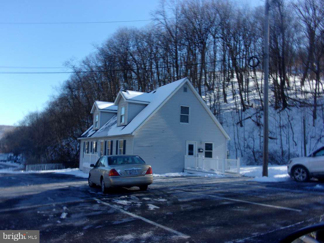 Sale is one acre +/- commercial lot in LaVale.  Currently subject to ground rent.