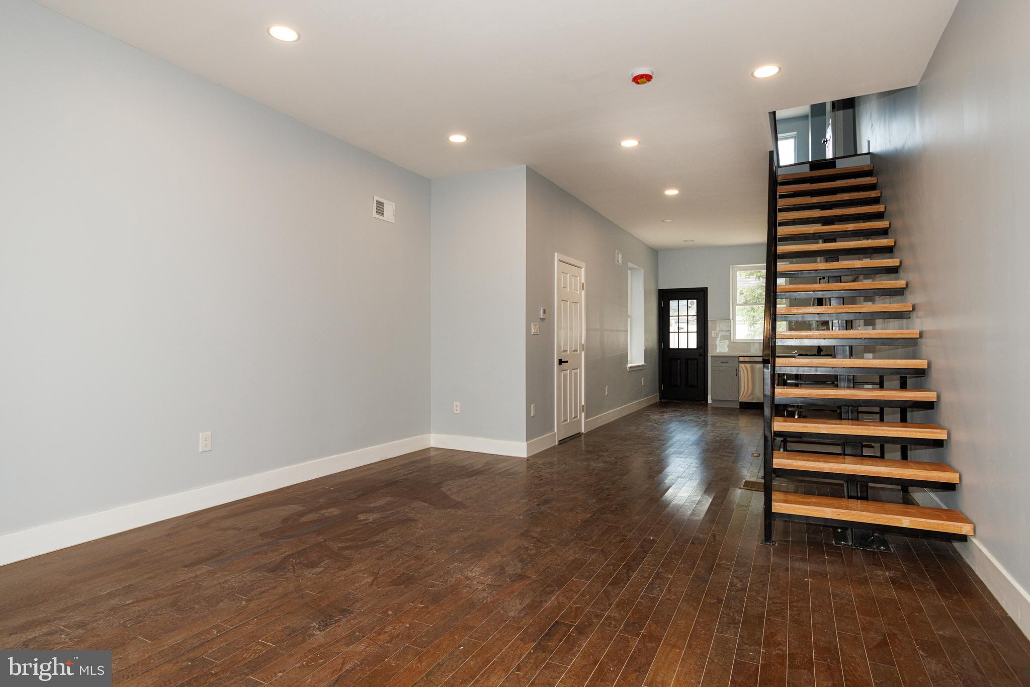 Beautifully updated 3-bedroom, 1.5-bath home in the Grays Ferry neighborhood featuring modern finishes, an open main level, and a private rear patio. The first floor offers a spacious living and dining area with dark hardwood-style flooring, recessed lighting, and a clean modern layout that flows into an updated kitchen with white cabinetry, stainless steel appliances, tile backsplash, and sleek countertops.

Upstairs, you’ll find well-sized bedrooms with great natural light, continued hardwood-style flooring, and generous closet space. The full bathroom features a modern vanity, black fixtures, glass shower enclosure, subway tile, and stylish finishes. The finished lower level provides additional usable space for storage, a home office, gym, media room, or play area.

Out back, enjoy a private concrete patio with vinyl fencing, perfect for relaxing, entertaining, or creating an outdoor hangout space. Conveniently located in Grays Ferry with access to nearby parks, public transportation, University City, Center City, and major commuter routes. A strong option for an owner-occupant or investor looking for a move-in-ready home in a growing Philadelphia neighborhood.