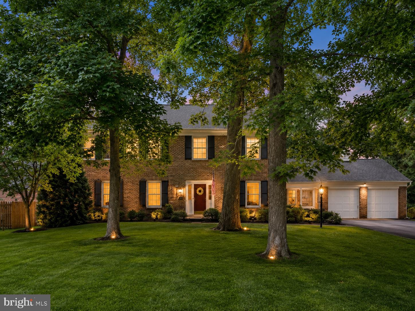Welcome to 8700 Camille Drive, a spacious 4-bedroom, 3.5-bath brick colonial tucked away on a quiet cul-de-sac in Potomac. Beautifully maintained and freshly painted, this home offers the perfect blend of privacy, space, and convenience.  The main level features a welcoming living room with a wood-burning fireplace, a formal dining room, and a large family room with parquet floors, a brick hearth, and a second wood-burning fireplace. The eat-in kitchen offers granite countertops and stainless steel appliances, while a private first-floor office, laundry room, and powder room add everyday functionality. Hardwood floors run throughout much of the home.  Upstairs, you'll find four generously sized bedrooms and two full baths, including a spacious primary suite with a renovated bath featuring custom tile, dual sinks, a walk-in glass-enclosed shower, a formal dressing area, and a large walk-in closet.  The lower level offers a large recreation room, full bath, bonus room, work area, and additional refrigerator and freezer. Major updates include newer roof, siding, Carrier HVAC system, and tankless water heater. An attached two-car garage provides ample storage and convenience.  Situated on a large, level, landscaped lot with mature trees and a stone patio, the outdoor space offers plenty of room to relax, play, or entertain.  Ideally located near Cabin John Village, shopping, dining, parks, major commuter routes, and public transportation, and within the highly sought-after Winston Churchill High School cluster, this home presents an exceptional opportunity to enjoy one of Potomac's most desirable neighborhoods.