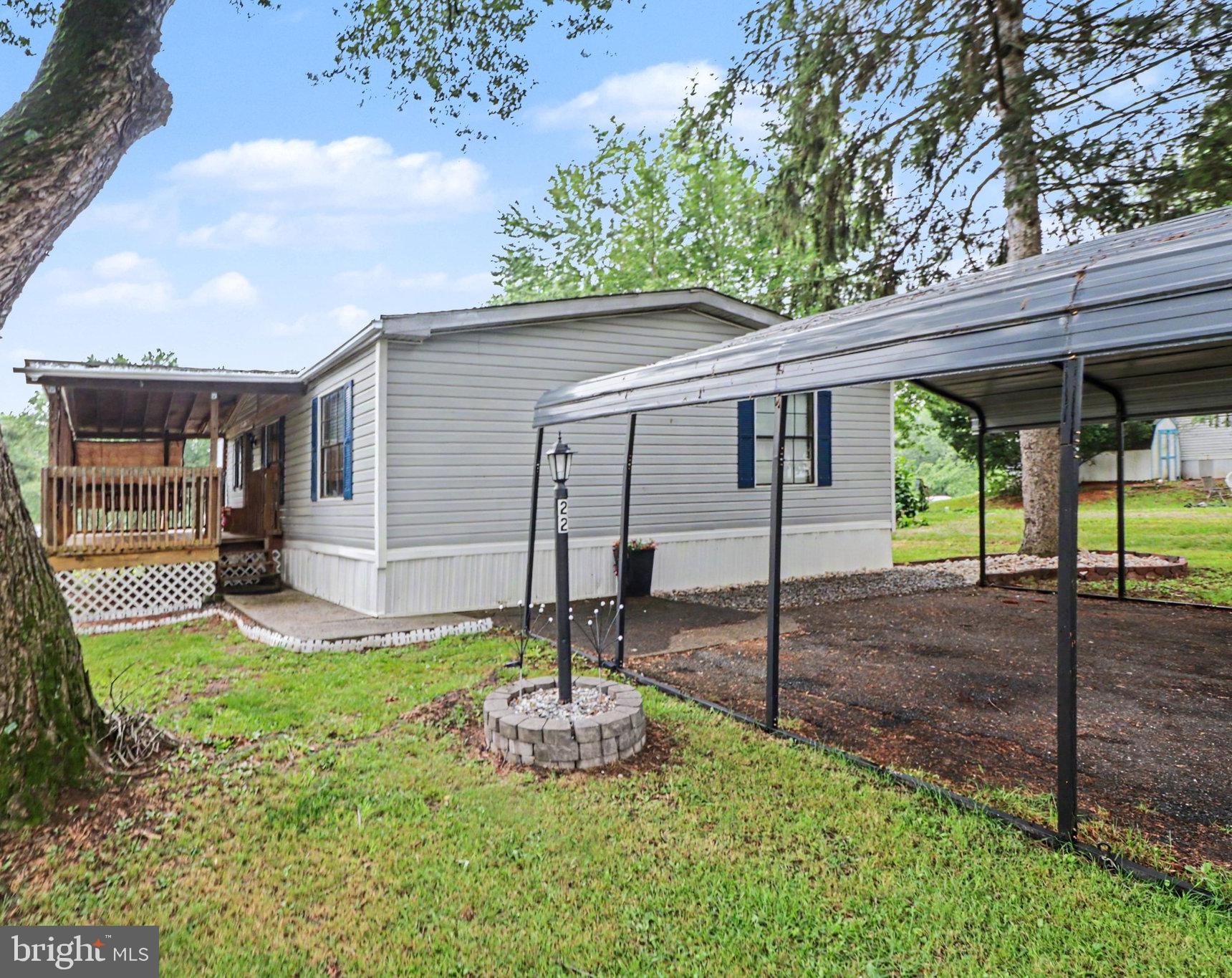 Welcome to this beautifully maintained 3-bedroom,
2-bath home in the desirable Country Manor West
community! This move-in ready home features a
spacious eat-in kitchen with stainless steel appliances,
ample cabinet space, and a center island, making it
perfect for everyday living and entertaining. The primary
suite offers a walk-in closet and a private full bath, while
two additional generously sized bedrooms share a
second full bathroom. A convenient laundry room with
built-in storage cabinets adds extra functionality. Step
outside to enjoy the beautiful deck, perfect for morning
coffee or relaxing evenings, along with a double carport
and a storage shed for added convenience. Recent
updates include a new HVAC system, new vinyl flooring
in the bedrooms and bathrooms, and added insulation
beneath the home for improved energy efficiency.
Beautiful landscaping enhances the home's curb
appeal. Conveniently located near shopping, dining,
and major highways. Buyer must be approved by
Country Manor West Manufactured Home Community.