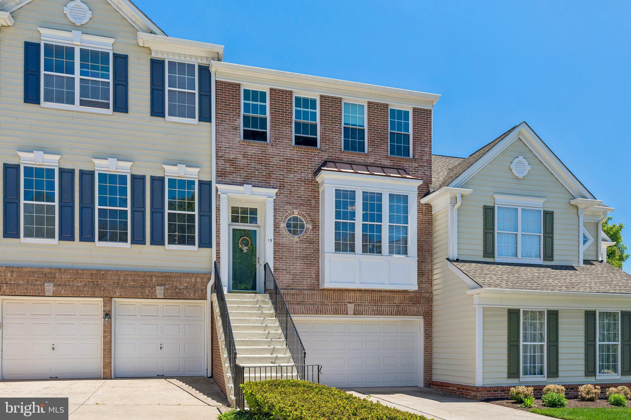 Welcome to 15 Charter Oak Court, located in the highly desirable Doylestown Station community. This beautifully cared-for townhome offers more than 2,000 square feet of comfortable living space, featuring 3 bedrooms, 3.5 bathrooms, and a layout designed for both everyday living and entertaining. From the moment you step inside, you’ll notice the bright and inviting atmosphere, with a welcoming foyer, convenient powder room, and extra storage space. The spacious kitchen offers plenty of cabinetry, generous countertop space, a pantry, and a sunny breakfast area surrounded by natural light from oversized windows. Just beyond the kitchen is the dining area, thoughtfully positioned to overlook the sunken living room below, creating an open feel while still giving each space its own character and definition. The living room is warm and inviting, highlighted by a cozy fireplace and direct access to the upgraded Trex deck, the perfect spot for morning coffee, outdoor dining, or relaxing evenings. Hardwood flooring, crown molding, custom trim details, and elegant wainscoting add timeless charm throughout the main level. Upstairs, the spacious primary suite serves as a relaxing retreat with a large walk-in closet and an en-suite bathroom complete with a soaking tub and separate shower. Two additional bedrooms, a full hallway bathroom, and second-floor laundry provide practicality and convenience for daily life. The finished lower level offers flexible additional living space ideal for a family room, home office, gym, or guest area, along with walkout access to a private patio. This level also connects to the attached 2-car garage and additional storage space.
Located within the award-winning Central Bucks School District, the home is just a short walk to Central Park through nearby walking trails, providing easy access to Kids Castle, open green space, playgrounds, and the outdoor amphitheater with summer concerts and events. You’re also only minutes from the heart of Doylestown Borough, known for its restaurants, shopping, museums, and year-round community events. This is a fantastic opportunity to own a move-in-ready home in one of Doylestown’s most sought-after neighborhoods.