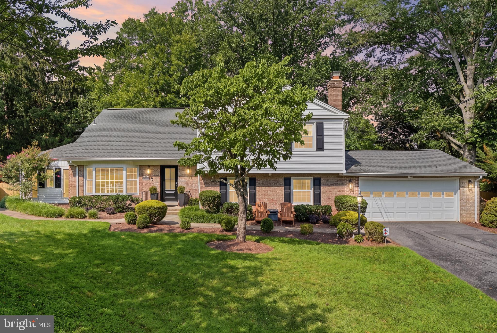 Welcome to an incredible opportunity in the highly sought-after Sherwood Manor! Set well back from the street on an extended private driveway with ample parking for family and guests, this impressive 3,400+ square-foot home offers space, style, and exceptional updates across three beautifully finished levels.
Your tour begins at the stunning custom front door and continues into a home designed for both comfortable everyday living and unforgettable entertaining. At the heart of the home is the spectacular 2022 gourmet kitchen, completely remodeled with high-end finishes and opening to a massive Great/Sun Room filled with natural light and large windows. Whether you're hosting gatherings or enjoying a quiet morning coffee, you'll love the flow between the Great Room, the kitchen's inviting breakfast area with a bay window, and the elegant formal living and dining rooms.  Beautiful hardwood floors run throughout the top 2 levels.  Step outside from either the Great Room or dining room to enjoy the private, fully fenced backyard—perfect for outdoor entertaining, pets, or simply relaxing in your own peaceful retreat. 
Upstairs, you'll find four spacious bedrooms, including a primary suite with a walk-in closet, an updated en suite bath, and a dedicated office. Need even more storage? The office, with a double window, can also be easily converted into a second walk-in closet, too. When you have space, you have options.
The finished lower level offers even more living space with a large family room centered around a beautiful brick fireplace, professionally rebuilt in 2020 and backed by a 10-year warranty. Just beyond, you'll find a flexible mudroom or fitness area with direct access to the oversized two-car garage.
This home has been metitulously maintained and thoughtfully updated for peace of mind, including fresh paint in many areas, new exterior siding (2021), a fully remodeled gourmet kitchen (2022), a new air conditioning unit (2023), a new water heater and washer & dryer (2024), new recessed lighting in the living room (2025), resurfaced hall bathroom tub in 2026 and a UV HVAC light installed in 2025 to enhance indoor air quality. Additionally, ask about additional features not listed here.
This is the perfect combination of generous living space, modern updates, and an exceptional location --- easy access to Westover Elementary School, Robinhood Swim Club, and the Rachel Carson Trail. Don't miss your chance to make this remarkable Sherwood Manor home your own!
