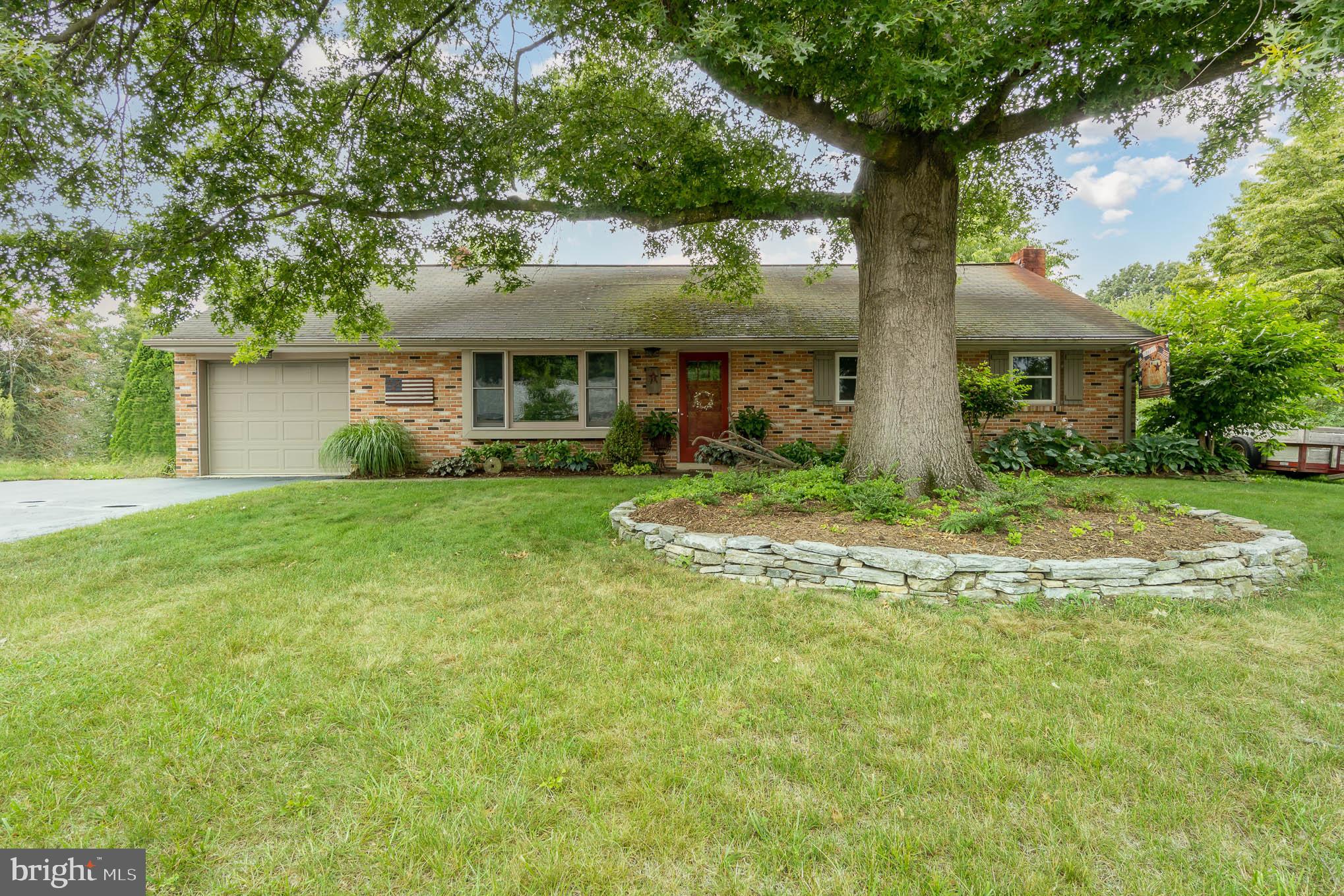 You won't want to miss this well cared for 3 bedroom brick rancher in Warwick Schools with attached 1 car garage. Located only a few minutes from downtown Lititz, this home has neutral and calming paint colors, hardwood floors, and updated windows throughout the home with a custom built bump out for the Anderson windows in the living room with a 17" deep windowsill/shelf. The kitchen has been updated with a tile backsplash, and lots of natural light from the rear doors that lead to the back porch!  The covered back porch is the perfect spot for your morning coffee, overlooking the mature landscaping in this back yard. Additional living space located in the basement with a wood/coal stove, as well as an additional work area. Don't wait, schedule your showing today!