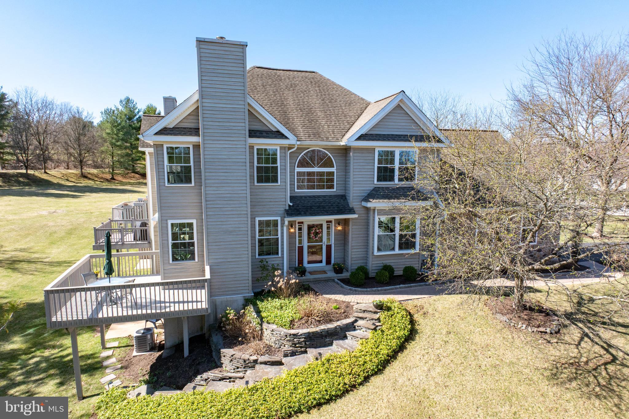 Nestled in the highly desirable Fernleigh community, this private end-unit townhouse offers both comfort and convenience. Located just a 2-minute drive from Phoenixville Country Club, and within 10 minutes of downtown Phoenixville's vibrant shops and restaurants, Valley Forge Park, King of Prussia Mall, and major routes including Rt 422, I-76, and the Pennsylvania Turnpike, this home provides easy access to numerous amenities.  As one of the larger models in the community, this residence features a finished lower level that adds approximately 650 sq ft of living space. Upon entering, you're welcomed into a two-story foyer adorned with wood flooring and bathed in natural light. The living room invites relaxation with its natural gas fireplace and sliding doors that lead to an east-facing deck equipped with a new awning, perfect for enjoying sunrises and shaded evenings. Adjacent to the living room, an additional space offers versatility as a home office, reading nook, or playroom.  The spacious dining room, also with wood flooring, connects seamlessly to an oversized kitchen. This culinary space boasts a pantry, island, double sink, and a peninsula with overhang for extra seating. The vaulted ceiling with skylights enhances the kitchen's openness and brightness.  On the second floor, the primary bedroom overlooks the serene open area at the back of the property. It features a generous walk-in closet and an ensuite bathroom complete with a jetted tub, double sinks, and a walk-in shower. Two additional bedrooms, each with walk-in closets, a hall bathroom, and a conveniently located laundry room complete this level.  The finished daylight walkout basement offers a more casual living area, highlighted by a gas fireplace and sliding doors that open to a patio.  Easily add a bathroom with rough-in plumbing already there.  An additional 520 sq ft of unfinished space provides ample storage, including a laundry tub.  Recent updates include a new roof and skylights in 2017, a new HVAC system in 2021, and a new water heater and awning in 2025. This well-maintained home combines modern amenities with a prime location, making it an exceptional opportunity in the Fernleigh community.