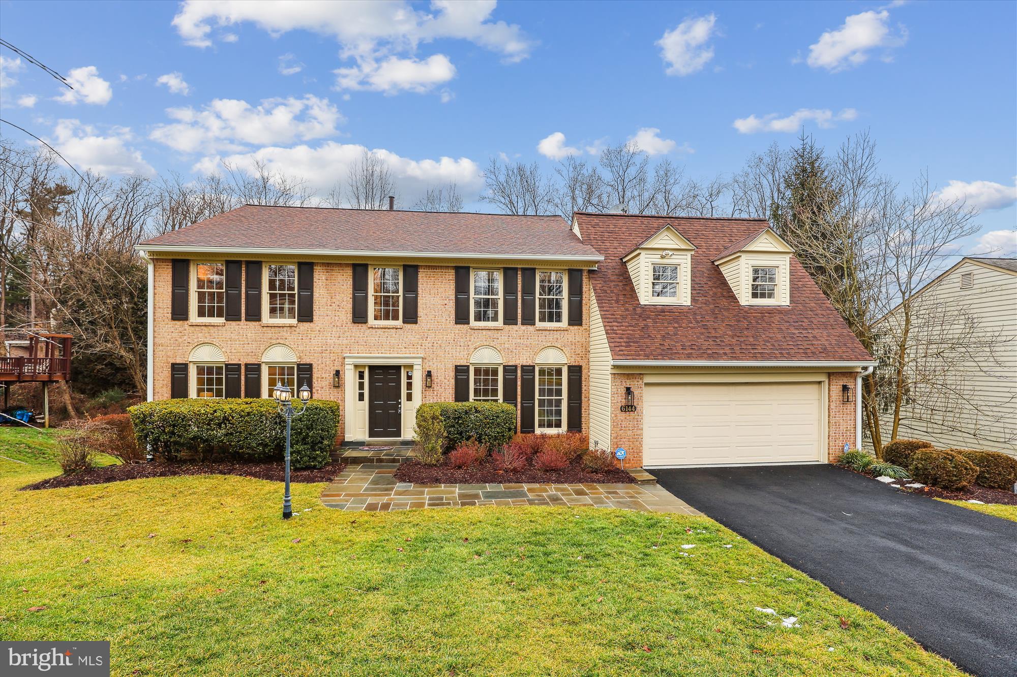 *ABSOLUTELY BEAUTIFUL* 5BR/3.5BA home on 4 finished levels conveniently located on quiet cul-de-sac street in sought-after Chesterbrook Woods!  Minutes from DC,  just one mile to GW Parkway, close to commuter routes, parks, and Chesterbrook shopping center. Sought-after Chesterbrook, Longfellow, McLean Schools! This spacious and inviting home boasts 5000 sq. ft. of living space. The main level features gleaming hardwood floors with many large windows at the back of the home with amazing light throughout the day and lovely wooded views. The inviting main level includes a spacious living room that flows into the formal separate dining room with crown molding and chair rail.  The light-filled gourmet kitchen with huge picture/bay window (perfect for an eat-in space) includes gas island cooktop, granite counters, recessed lighting and ample cabinet space. Just off the kitchen, head into the stunning 2-story family room with gas fireplace, skylights, and walk-out to the 2-tiered deck area. Main level laundry room, powder room and 5th BR/office (with convenient elevator access up to the primary BR), complete the level.  Upstairs, retreat to the spacious primary bedroom with 2 walk-in closets, dressing area and luxury ensuite bathroom with dual sinks, granite counters, soaking tub and frameless shower. This level also features 3 large additional bedrooms and full bathroom.  The lower level includes a cozy den/extra family room plus full bathroom and guest room space with closets - could be utilized as office/den or in-law/au pair space.  A few more steps takes you to the HUGE walk-out recreation room with bar area and raised platform dance floor - an entertainer's dream!  Enjoy the privacy of living on a cul-de-sac street with the convenience of downtown McLean.  Updates include:  new carpet, roof, siding & gutters, asphalt driveway, recessed lighting.