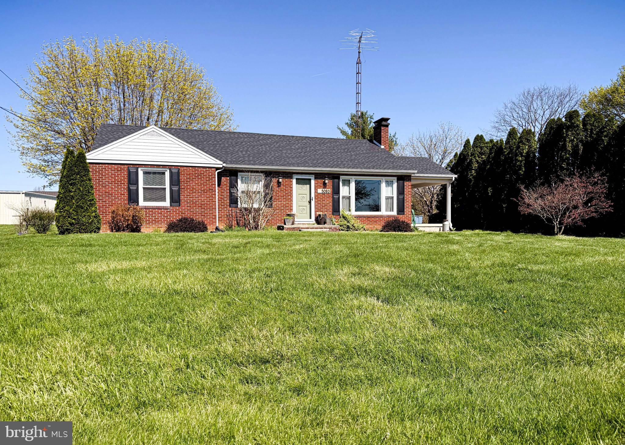 Nestled in the heart of Marion, this charming 3-bedroom, 1-bathroom brick rancher offers the perfect blend of convenience and tranquility. Located on Main Street, you'll enjoy easy access to nearby highways while benefiting from the quiet, quaint atmosphere of the town. The home features a large bay window, a remodeled kitchen, a brick fireplace, and beautiful hardwood floors. The basement provides ample storage space, and the detached garage is ideal for parking your vehicles and working on projects.