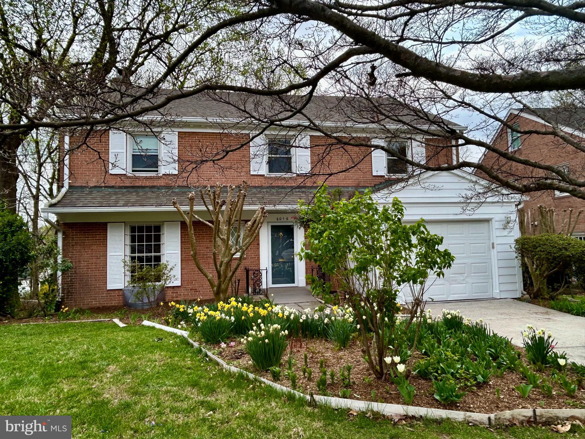 ((Update: PENDING - Multiples in first 12 hours. Thank you agents and buyers.)) Bring your big ideas. Perched atop a quiet street in one of Bethesda's most naturally beautiful neighborhoods, 6016 Onondaga Road delivers space along with incredible potential. This six-bedroom, four-and-one-half bath brick colonial enjoys treetop views and tremendous upside.

Inside, classic architectural bones are ready for your next chapter -- generous room sizes, hardwood floors, crown and decorative moldings, wide doorways, and big windows throughout. The main level offers multiple spaces for entertaining and daily life: a traditional foyer, a formal living room with fireplace, a den or library with built-ins and a wet bar, a separate dining room wrapped in windows, and a large table-space kitchen that invites your personal touch. Direct access from the one-car attached garage makes for easy grocery runs and great flow.

Gorgeous picture moldings line the wall of the staircase to the second floor, setting a tone for warmth and character.  Upstairs, the primary suite offers a walk-in closet, en suite bath, and connected sitting room or office with fireplace. Two additional bedrooms share a full hall bath. The top level features two more bedrooms and another full bath -- a rare and valuable layout.

The walk-out lower level brings even more space with an expansive rec room featuring exposed brick, a fireplace, and sliding doors to the backyard. A sixth bedroom, full bath, laundry area, and storage round out the lower level. The private driveway provides off-street parking and room for play.

6016 Onondaga Road is just minutes from the trails, parks, and arts at Glen Echo, the beauty of the Potomac River, and the convenience of downtown Bethesda, Friendship Heights, NW D.C., and major commuter routes.