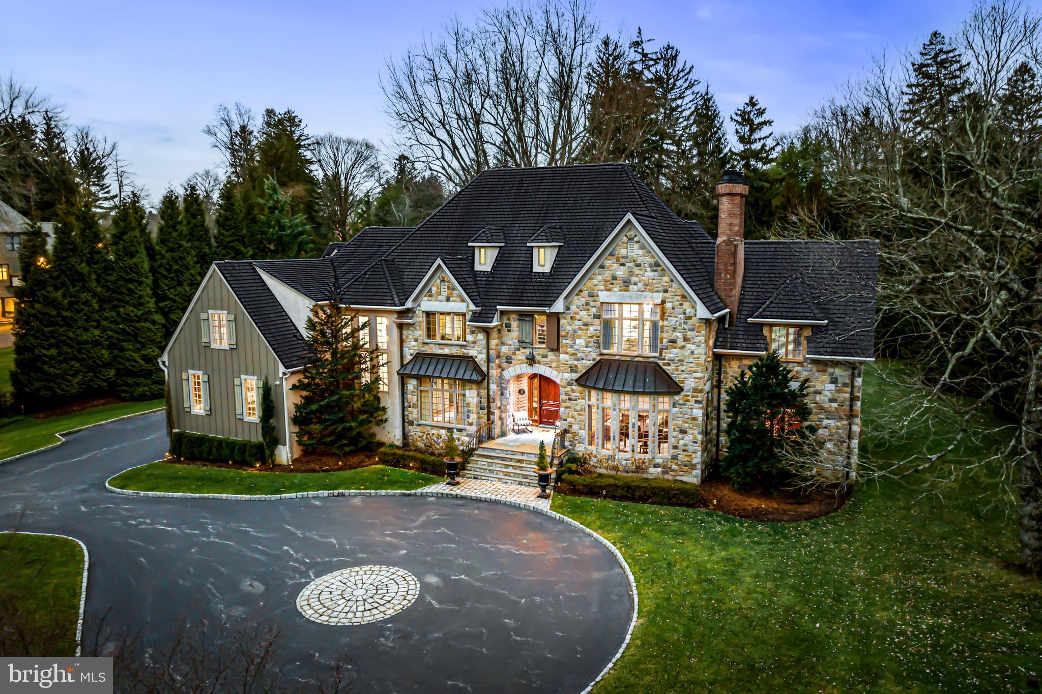 Look no further! This incredible property, located in the highly coveted  Merion Golf neighborhood, offers beautifully crafted  bright open spaces throughout with gracious rooms, stunning materials, millwork, floors and moldings, timeless finishes, seamlessly integrated modern updates, a separate but attached 1-2 bedroom Guest Cottage/ Pool House, 4-car garage capacity with additional space for 2-lifts, elevator shaft servicing the main house and a fully fenced lot. This treasure is a rare find! Additional features include a spacious front to back entrance foyer, flanked by open access to the living and dining rooms, expansive library, fabulous gourmet kitchen with adjacent family and breakfast rooms, luxurious primary suite with dramatic windows, spacious marble bathroom and 2 walk-in custom closets, generous second bedroom with en-suite bathroom, and sun-filled window, large third and fourth bedrooms with Jack and Jill bathroom, private third floor suite with bedroom, lounge area and full bathroom, expansive day-lit lower level with media/ game room, theater, gym, playroom, powder room and lots of storage. A rare find in a quiet, walking neighborhood close to renowned schools, fabulous restaurants, clubs, recreational opportunities, trains, parks and much more. Move right in. Pool plans available.
