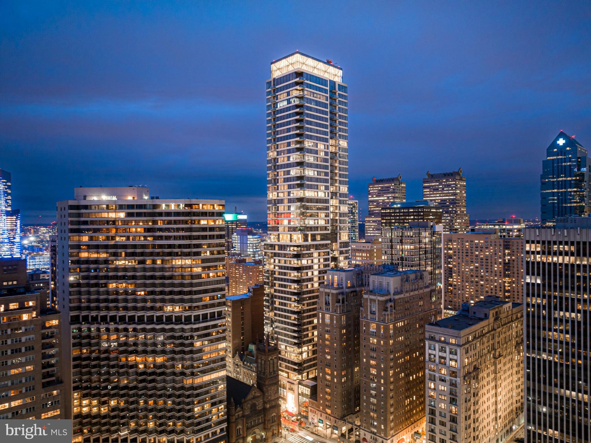Welcome to The Laurel. Named for Pennsylvania s state flower, The Laurel introduces a lifestyle worthy of this final residential opportunity on prestigious Rittenhouse Square. With hotel-like amenities included for all owners, we offer the carefree enjoyment of city living. The meticulously curated array of services and amenities include an indoor and outdoor pool along with a stunning club room and expansive terrace overlooking the Square.  Above it All  with panoramic vistas of city and sky, we are the tallest all residential building in Philadelphia. 
The Sky Residence 1(S1) is a 3 bedroom home located on the South East corner. The location of this unit lends to its own panoramic views throughout, showcasing beautiful  sunrises over the Delaware River and sunsets over the Schuylkill River. Over 2400 square feet of luxury awaits you with  134 SF balcony overlooking Rittenhouse Square, this home is sure to  WOW ! The open floorplan offers furniture style custom built European kitchen cabinets by Hans Krug. The appliance package includes a Sub-Zero integrated refrigerator, Wolf gas cooktop, state of the art steam oven and full size convection oven. The oversized kitchen island features Quartz counters with waterfall edges, a large under mounted sink, Dornbracht faucet, Signature power steam dishwasher and under-counter drawer microwave. The primary bathroom is complimented by an expansive shower with Fantini shower fixtures. The luxurious freestanding soaking tub sits atop stunning marble floors surrounded by floor to ceiling porcelain walls. A laundry room with full size Maytag washer and vented dryer complete this magnificent residence.