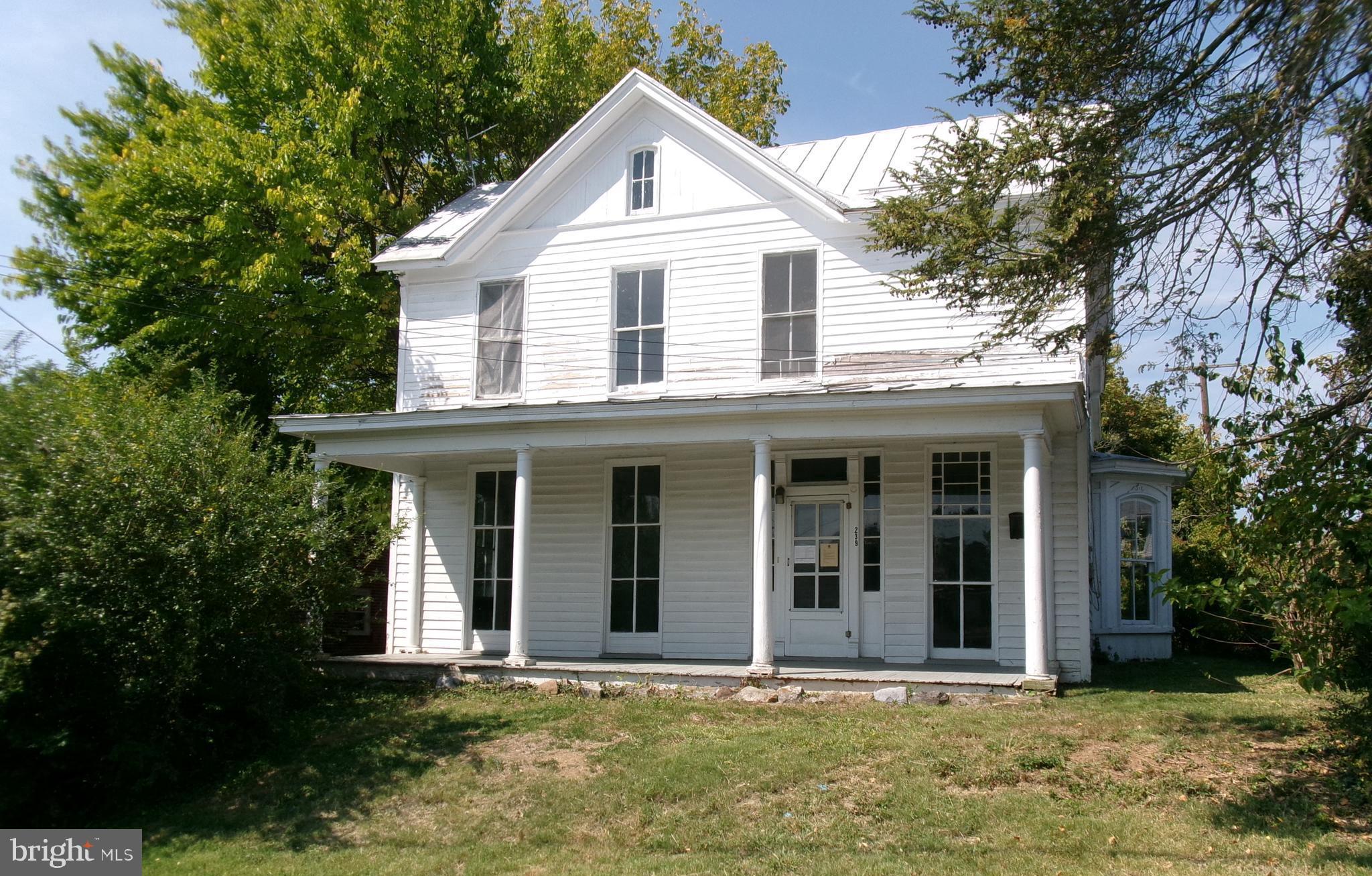 Step back in time in this 129-year-old home. It is full of personality and charm. From the floor-to-ceiling 
 windows at the front of the house, the large kitchen, the lovely front entry, and the hardwood floors throughout most of the house. It has large bathrooms and 3 nice size bedrooms, with the potential for the former sleeping porch to become a 4th. This grand home has so much room to grow in design and space. You won't want to miss out on this hidden treasure. This is a Fannie Mae HomePath property.
