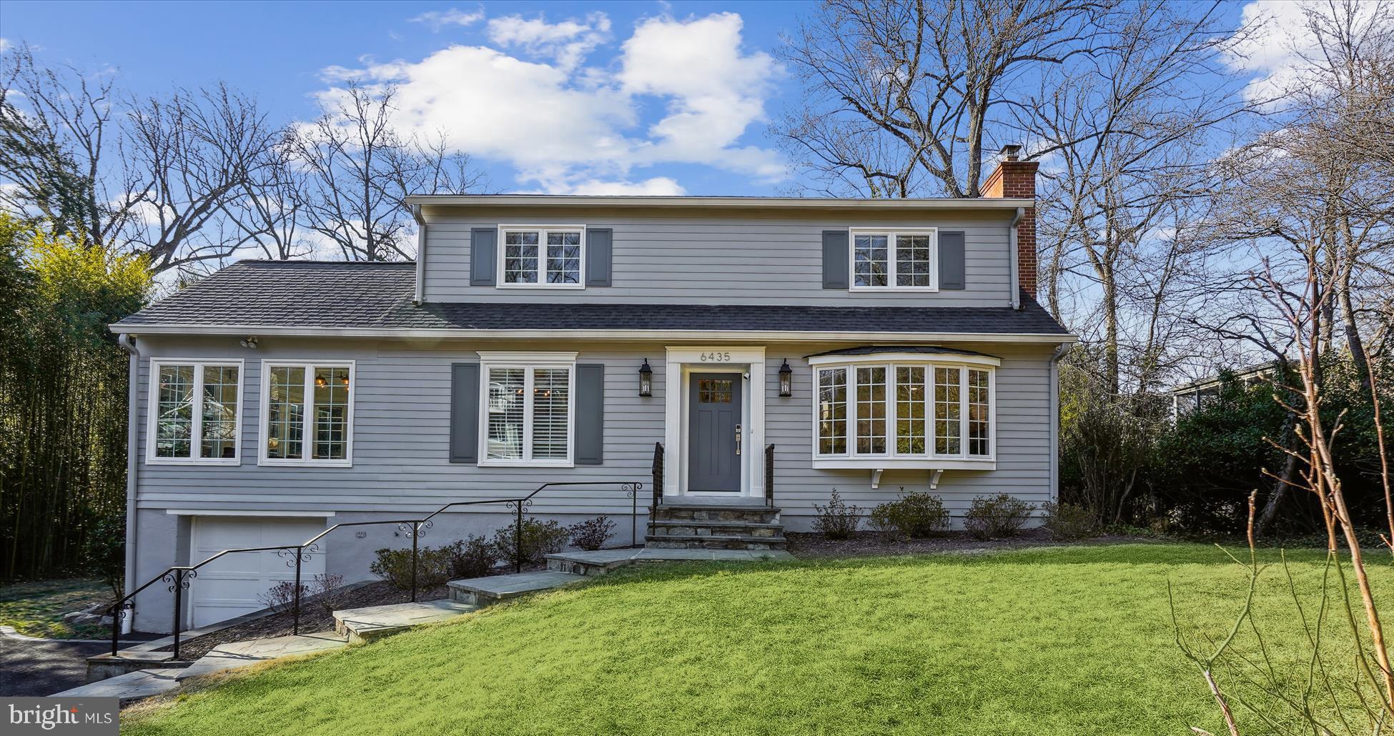 STILL AVAILABLE, WE HAVE A KICK-OUT CLAUSE! DON'T MISS OUT This beautifully renovated home sits on a private no-thru street, offering charm, modern updates, and a fantastic layout. Thoughtfully designed, the home features stunning craftsmanship throughout, including new two-panel doors, elegant flat-panel wainscoting, breadboarding, custom built-ins, and striking wood wall accents in many of the rooms. Stylish tilework enhances the bathrooms and kitchen, while recessed lighting adds a warm, contemporary touch. Hardwood flooring flows seamlessly throughout the main and upper levels. Flooded with natural light, the home boasts all-new windows, a built-in alarm system for added security, and generous storage throughout.
Step into a welcoming foyer with a coat closet leading into a bright and spacious living room. A gorgeous bay window with a built-in seat, a wood-burning fireplace with a custom mantel and tile surround, and elegant plantation shutters add to the charm of the space. The dining room features modern wainscoting, crown molding, and plantation shutters. A sun-filled all-season sunroom is wrapped in windows with honeycomb shades and kept comfortable year-round with a built-in mini-split system. The beadboard walls and ceiling add a touch of charm, while direct access to the deck creates a seamless indoor-outdoor connection.
The main level features a private office that opens to the family room, offering both functionality and privacy. This versatile space can also serve as a fifth bedroom. A chic powder room features a beautiful vanity, custom mirror, marble countertops, and stylish tile flooring. The step-down family room is a showstopper, boasting high ceilings, custom built-ins, and a large picture window that overlooks the backyard.
The kitchen is nothing short of exceptional, showcasing custom wood cabinetry, quartz countertops, and a striking subway tile backsplash. A spacious center island offers additional seating, while high-end Café appliances include an induction range with its own oven, plus a separate wall oven for added convenience. The breakfast area offers even more storage with built-in pantries, a large picture window, and a cozy window seat. From here, step outside to a two-level deck—one slate, one wood—overlooking the private backyard. Watch as vibrant cardinals and blue jays flutter between the trees, bringing the landscape to life. The 12,000+ sq. ft. lot provides ample space for play, outdoor activities, and even the potential for a pool.
Upstairs you’ll find four spacious bedrooms, all with generous closets and honeycomb blackout shades.
The primary suite is a true retreat, featuring  blackout shades and a luxurious en suite bath with an oversized shower and a full shower system. Two additional bedrooms share a stylish full bathroom and the fourth bedroom stands out with a spacious walk-in closet and a private en suite bath, featuring an oversized wheelchair-accessible shower,. A laundry room is conveniently located on this level, equipped with a full-size washer and dryer.
The fully finished lower level offers additional living space with a recreation room featuring tile flooring, built-in shelving, and a fabulous cubby area for coats, backpacks, and more. A separate exercise or craft room adds flexibility to the layout. This level also provides access to the one-car garage, complete with an EV charger. The driveway was recently paved with a stylish brick surround. An exercise area on this level features a newly installed mini-split system for personalized climate control. A large storage room houses the hot water boiler (just three years old praised for efficient heat distribution, comfort, durability and quiet operation), hot water heater, and two electrical panels.
• Wood Acres Elementary
• Thomas Pyle Middle School (#3 in Maryland, U.S. News & World Report, May 2024)
• Walt Whitman High School (#2 in Maryland, U.S. News & World Report, May 2024)