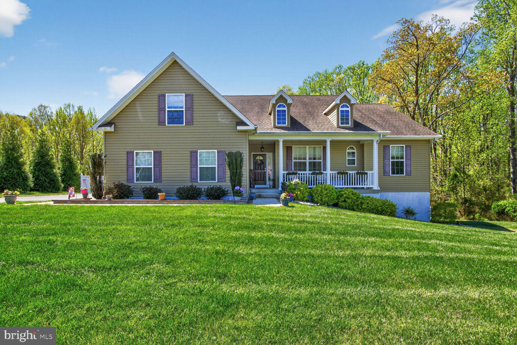 Welcome to this beautifully maintained 5-bedroom, 4-bathroom home tucked away on a private 1.09-acre cul-de-sac lot in one of LaPlata’s most desirable settings. Built in 2014, this home offers a rare combination of modern construction, flexible living space, and serene surroundings.

The main level and upper floors provide 2,229 square feet of above-grade living space, complemented by an additional 772 square feet of finished basement offering room to live, work, and entertain with ease (approximately 650 sq. unfinished). Natural light fills the home, while the thoughtful layout allows for both open gathering spaces and quiet retreats. 

A standout feature is the fully finished lower lever in-law suite, complete with its own full kitchen, full bathroom, and private washer and dryer—ideal for multigenerational living, extended guests, or potential rental use.

Additional highlights include a 2+ car garage, generous bedroom sizes, and ample storage throughout. Outside, enjoy the peace and privacy of over an acre of land—perfect for entertaining, relaxing, or simply enjoying the outdoors. Yard has lawn sprinkler system. Enjoy your morning coffee while you sit on your beautiful front porch and enjoy a glass of wine on your back deck or
enjoy growing your own food in the separately fenced garden area.

Conveniently located while still offering a secluded feel, this property delivers the space, versatility, and quality today’s discerning buyers expect.

A rare opportunity for luxury, flexibility, and privacy in La Plata.

Electrical outlet added on driveway side of house for generator hook-up or RV hook-up.
Compressor on HVAC replaced 4/4/2026.
Interior Painted May 2026
Fresh river rock has been added to front beds - making maintenance a breeze. May 2026
Carpets will be professionally cleaned and bedrooms stretched after furniture is moved out - end of June.