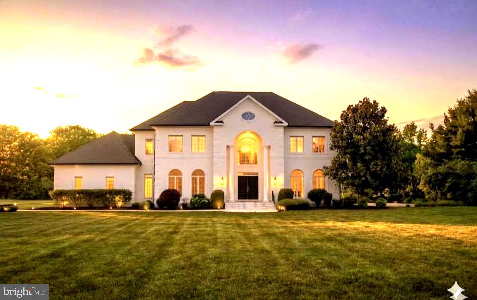 "NOTICE: Property is equipped with active indoor and outdoor video surveillance. Please notify your buyers prior to entering." 
Elegant luxury meets an unparalleled outdoor paradise in Leesburg’s highly sought-after Beacon Hill! Nestled within one of the region's most spectacular and prestigious communities—where neighboring estates regularly command ultra-premium multi-million dollar values—this beautiful property offers an extraordinary lifestyle. The true crown jewel of this estate is the breathtaking, jaw-dropping outdoor living oasis. The owners spared absolutely no expense, built a grand-scale custom patio that rivals elite luxury resorts. This massive outdoor sanctuary features extensive premium stonework, pristine landscaping, and boundless room for multiple lounging areas, high-end outdoor dining, and premier entertaining under the stars. Inside, the home exudes pure sophistication. The open, light-filled floor plan is defined by timeless elegance, featuring refined architectural details and graceful living spaces perfect for both grand hosting and intimate family moments. Enjoy the pinnacle of luxury living in a magnificent neighborhood setting. A beautiful crystal chandelier meets you at the entry hall of the house (it is attached to an electric chain hoist for ease of maintenance and bulb replacement); another crystal chandelier is installed in the dining room. This turnkey masterpiece is an absolute must-see! Photographs will be uploaded by 06/17