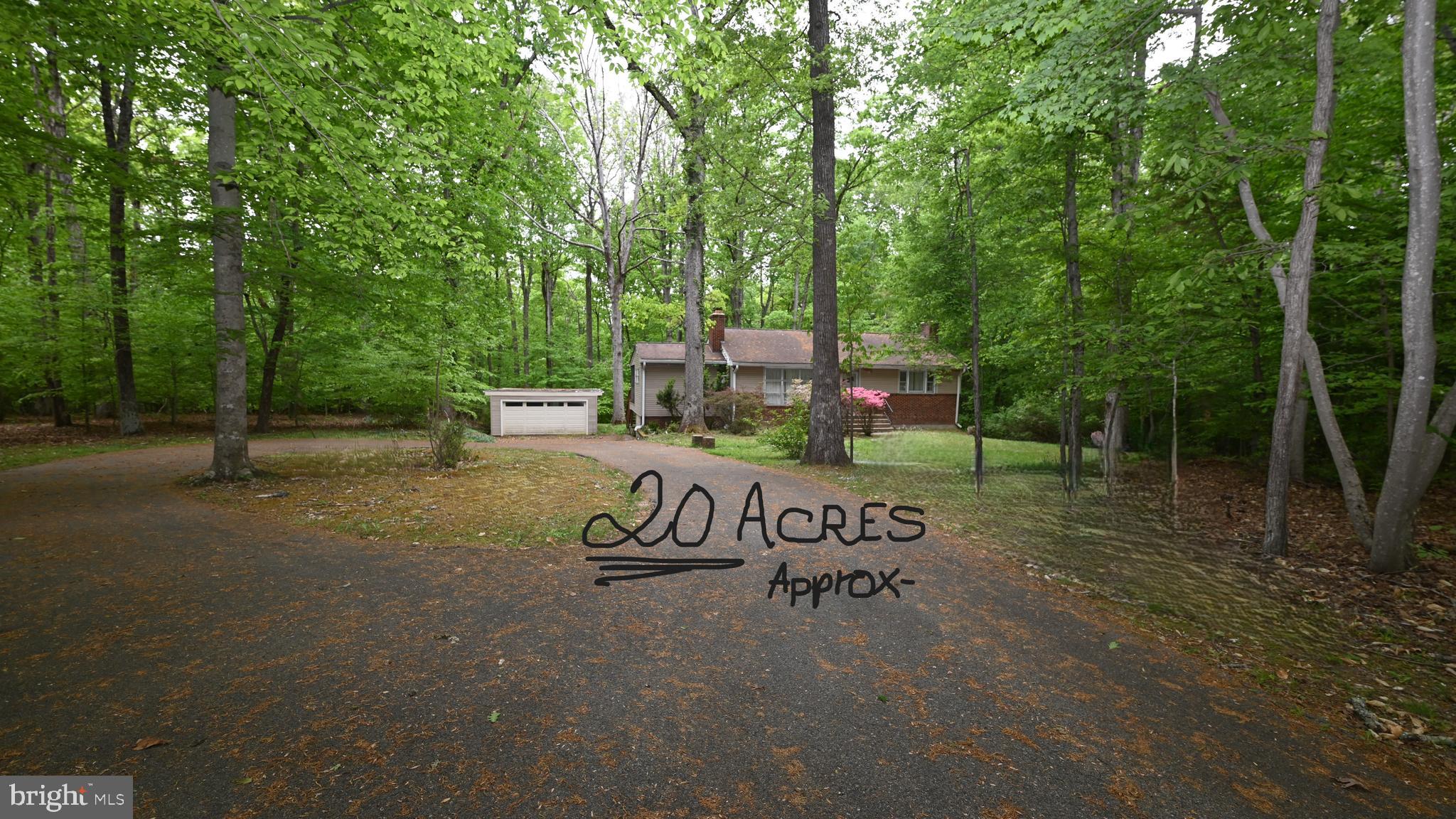 Serene Country Living on 21+ Wooded Acres – Priced to Sell!
Nestled on a little over 21 private, wooded acres, this charming brick rambler offers the perfect blend of comfort, space, and peaceful surroundings.
Step inside to find 3 bedrooms and 1 full bath, a spacious living room, and a separate dining room—ideal for everyday living or hosting gatherings. The large kitchen provides plenty of room to cook and create, with great potential to make it your own.
The full basement expands your living space with a generous great room, a dedicated laundry area, and abundant storage space—perfect for hobbies, a workshop, or future finishing options.

Out back, enjoy the beauty of nature from your screened-in porch with electric, which opens to an additional deck—a perfect setting for morning coffee, quiet evenings, or entertaining while overlooking your expansive property.

Additional highlights include a reliable oil-fired hot water baseboard heating system, known for delivering consistent and comfortable warmth throughout the home.

Whether you’re seeking privacy, room to roam, or a property with incredible potential, this unique offering is priced to sell and ready for its next chapter.  This is an "AS IS" Sale because it is an estate sale.  Please do your home inspection for your informational purposes only.        HOWEVER, this is a well-maintained home.