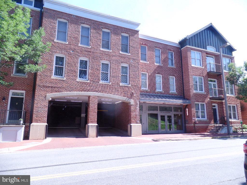 35 E All Saints Street Unit 212 is home to Maxwell Place, a sought-after contemporary condominium complex in Downtown Frederick, MD.  This corner unit has two spacious bedrooms and two and one half baths. Maxwell Place is a well known condominium complex with awesome grounds, a superior Carroll Creek location as well as awesome residents.   It offers highly walkable (96 out of 100) access to everything Frederick has to offer. Built in 2007 with an excellent maintenance record, the complex features elevators, a fitness center, secure entry, assigned parking, and storage units. Highlights include an open-concept layout,  tall ceilings and two private balconies.  Parking is a breeze and has a secured/gated garage system.  Maxwell Place is a vibrant and welcoming place. Call your agent! Professional Photos on the way.