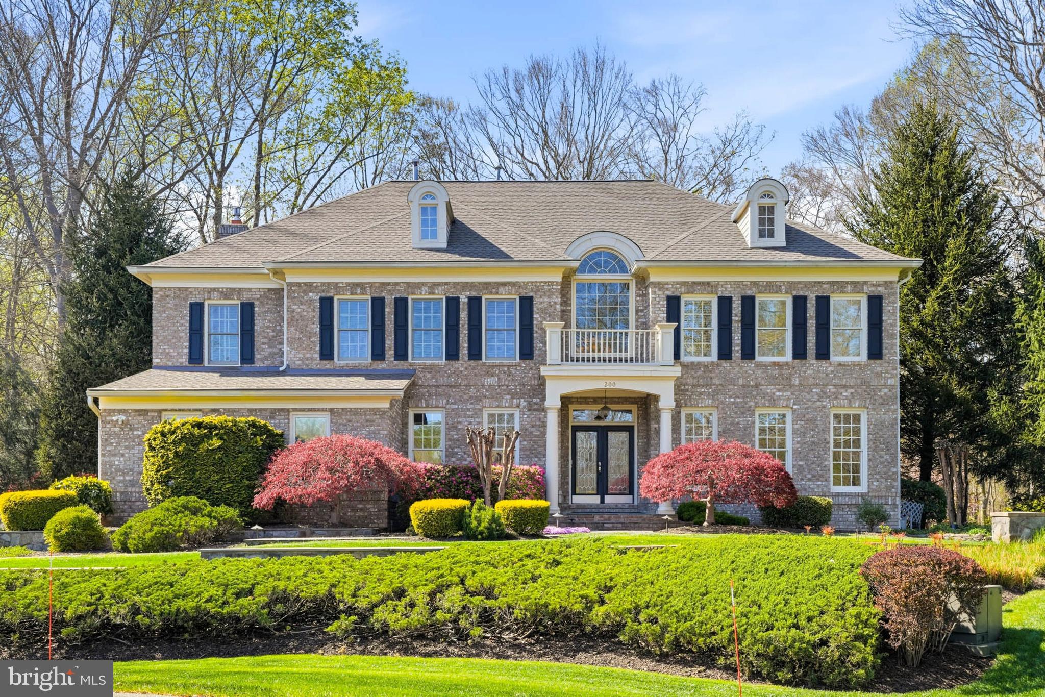 Perfect home to gather with friends and family. Located on a quiet cul-de-sac in The Preserve at South River Colony, this elegant and spacious all-brick colonial offers over 6,000 square feet of finished living space on just under an acre with a large side yard, lush landscaping, and private wooded views. Multiple shaded seating areas, a spacious lawn, and plantings designed to delight in all seasons create unique and welcoming spaces for outdoor play, relaxation, and entertaining. 

The front entry showcases marble flooring, soaring 22 ft. ceilings, an Italian alabaster glass chandelier, and a curved staircase leading to the second floor. This 4 to 5 bedroom, 5.5 bath home features hardwood floors, classic wainscoting, and detailed millwork. The spacious second floor primary suite features a tray ceiling, two walk-in closets, and a soaking tub with views of the woods. The open kitchen includes dual LG dishwashers (2025), a Sub-Zero refrigerator, and an island with cooktop and seating. It adjoins the two-story family room and a sky-lit sunroom that opens out to a gracious, wrap-around back porch, connecting the home to its outdoor setting. 

The finished, walk-out lower level has a full bath, large recreation room, wet bar,  additional guest room, and abundant storage. There is an additional roomy storage area under the back deck. The two-car attached garage includes ample built-in shelving and a 32Amp EV charger. The home features a new (2025) 40-year GAF Timberline HDZ shingle roof with transferable warranty as well as a gas powered generator with transfer station.  The home is pet-friendly with a buried electric dog fence.

The bucolic surroundings offer a peaceful retreat for nature enthusiasts, with year-round opportunities to observe birds and local wildlife. The professionally designed backyard is supported by a 15-zone, 75-head irrigation system and landscape lighting throughout, and features tiered levels, mature plantings, and a canopy of trees that enhance the serene setting.  Highlights include an 8,000-gallon stacked-stone pond with waterfall and chemical-free UV light water purification system, and a horseshoe court with regulation pits.  

Sited on a generous lot with public water, sewer, and natural gas, this home is part of the South River Colony Conservancy—a beautifully maintained community just south of Annapolis. Amenities include a pool with swim league, tennis and pickleball courts, walking trails, and tot lots. The neighborhood is home to The Golf Club at South River, a private members-only 18-hole course with restaurant, fitness center, and golf simulator lounge. The location is convenient to historic Annapolis, the South River, Washington, D.C., and Northern Virginia.