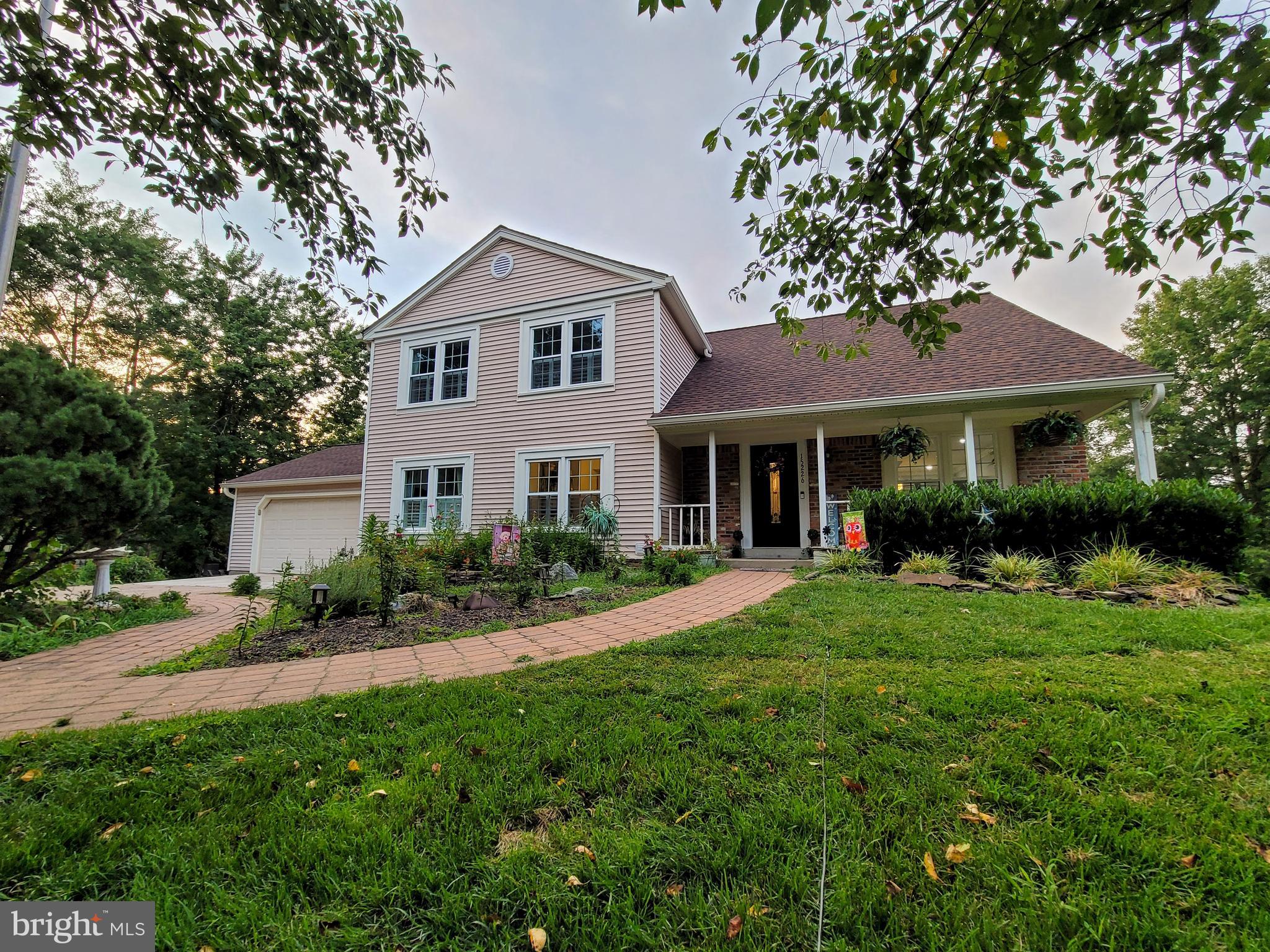 Beautifully renovated home on the largest lot in the neighborhood!  It is over 1/2 acre!  Oversized, 2 car garage and widened concrete driveway.  Detached carport with electricity, lighting and ceiling fans.  Bright open living room and dinning room with bay window and hardwood floors.  The kitchen was renovated in 2021, including new appliances, and flows into the breakfast nook with a bay window.  Gleaming hardwood floors throughout the mail level, stairs and upper hall.  Spacious upper level owner's suite offers 3 closets, a private sitting room or baby room, dressing area with vanity, and a full ensuite bathroom renovated in 2021.  The other 2 full bathrooms were also exquisitely renovated in 2021.  The lower level rec room exits to the backyard.  The basement also offers a workshop plus a huge storage closet.  There are many updates including a new roof, gutters, window wraps, new windows and sliding glass doors, freshly painted.  Updated deck, landscaping, and walkway.
