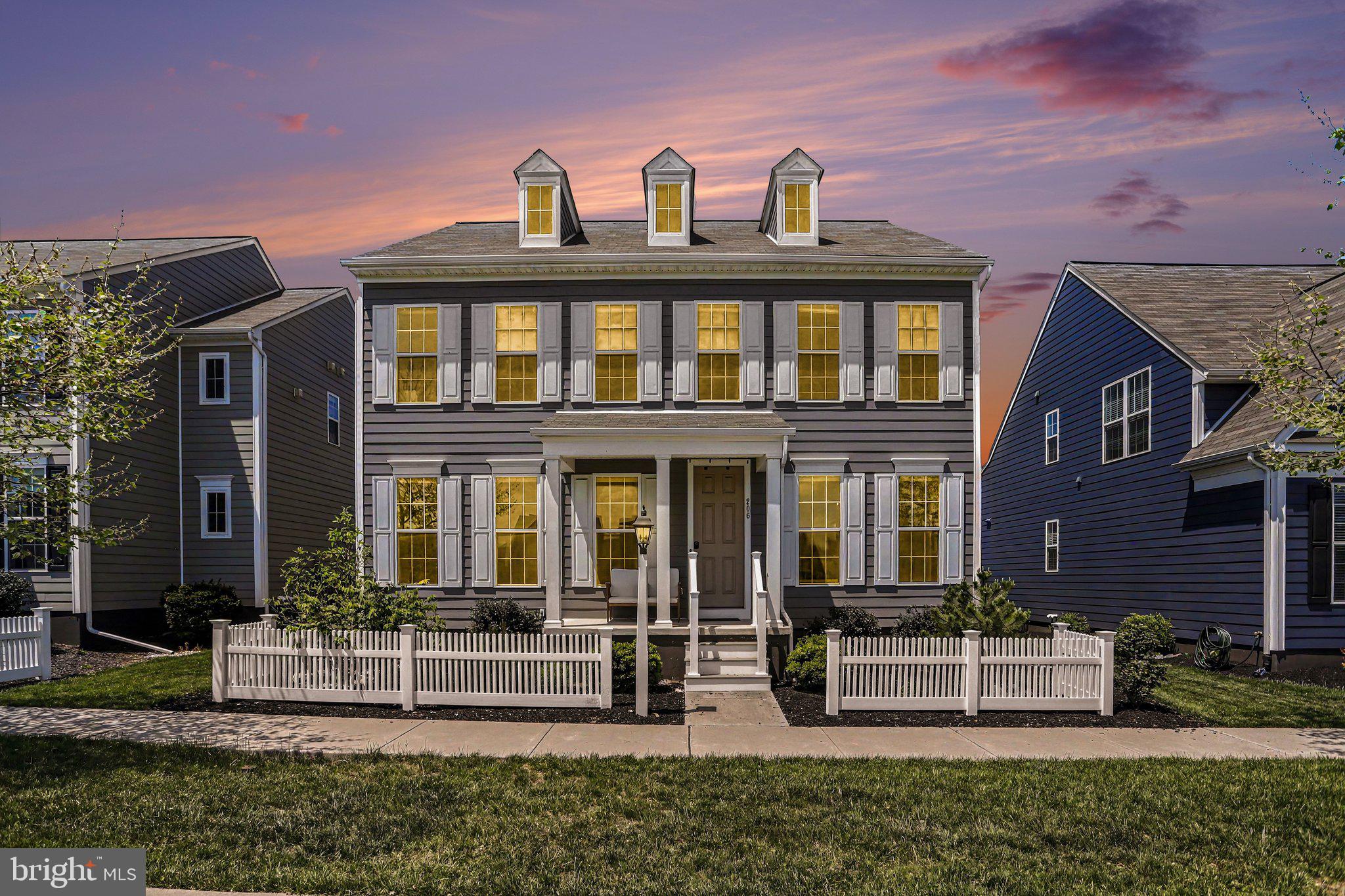 Step into timeless elegance and modern comfort with this beautifully maintained 2019 traditional-style home that radiates exceptional curb appeal and warmth from the moment you arrive. From the inviting exterior to the thoughtfully designed interior, every detail of this home creates a welcoming atmosphere perfect for everyday living and entertaining alike.

As you enter through the front door, you are immediately greeted by an abundance of natural light pouring through oversized windows, creating a bright and airy ambiance throughout the home. The spacious main level offers an ideal flow, highlighted by a stunning kitchen featuring a large center island with seating for four, ample cabinetry, and generous prep space for gatherings both large and small. Adjacent to the kitchen, the charming breakfast area is surrounded by windows on three sides, providing the perfect setting to enjoy your morning coffee.

The expansive family room serves as the heart of the home, offering comfort and space for relaxing evenings, while a private den/office located on the opposite end of the main level creates the ideal work-from-home setup or quiet retreat. Convenient main-level laundry adds to the home's thoughtful functionality.

Upstairs, the luxurious owner’s suite offers a peaceful escape complete with a spacious walk-in closet and a beautifully appointed en-suite bath featuring a large tiled walk-in shower. Three additional generously sized bedrooms, a full guest bath, and a cozy loft area perfect for reading or unwinding complete the upper level.

The lower level provides incredible potential with abundant storage space and already framed areas for a future entertainment room, bathroom, and additional bonus rooms — simply awaiting your finishing touches to create the ultimate customized living space.

Just off the rear of the home, you’ll find a truly unique oversized garage space with endless possibilities. The front half could easily be transformed into a stunning sunroom or entertaining area, complete with French doors leading out to a semi-private patio designed for outdoor gatherings, peaceful evenings, and enjoying the beauty of your surroundings.

This exceptional home seamlessly combines style, space, comfort, and future potential — a rare opportunity to own a property that truly feels like home the moment you walk inside.