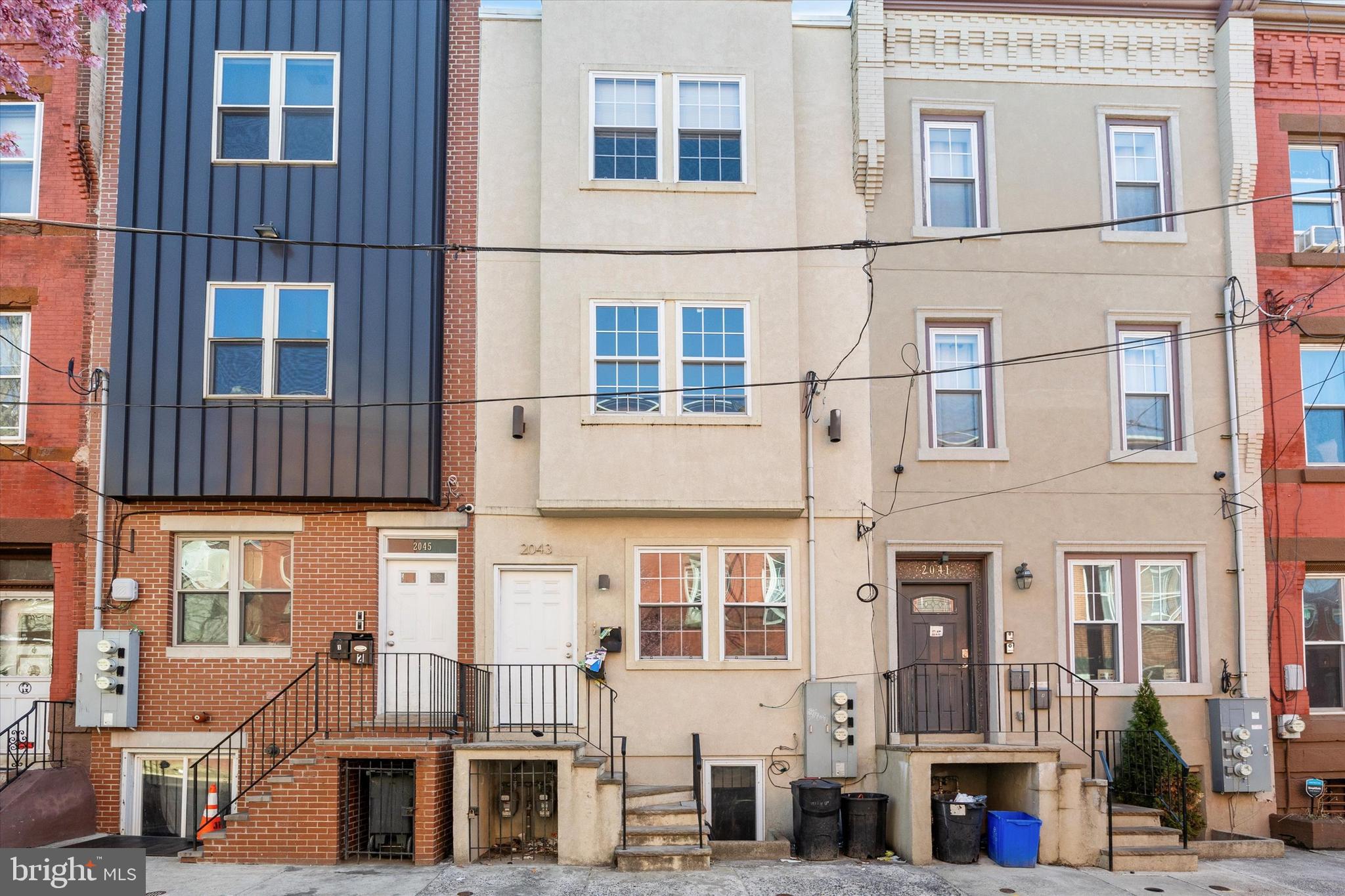 Located in the heart of North Philadelphia’s North Central neighborhood, 2043 N Gratz St is a spacious duplex offering a high-income investment opportunity, ideal for student housing near Temple University.
This well-maintained property features two large units, each designed for comfortable living: Unit 1 has 5 Bedrooms, 2 Bathrooms, and a 2,000+ Sq. Ft.    Unit 2 has  4 Bedrooms, 2 Bathrooms, and a 2,000+ Sq. Ft.
Inside, both units offer bright and open living areas, generously sized bedrooms with ample natural light, and modern bathrooms. The second-floor unit features a large common area that flows into a galley-style kitchen, making it ideal for student renters.
The location is unbeatable, just an 11-minute walk to the BSL Susquehanna-Dauphin Station, providing quick access to Center City and beyond. It's also a short 20-minute walk to Temple University, making it a top choice for student housing.
Conveniently located near Lawn Chairs, Beury Beach, and Reyburn Park, this home offers easy access to SEPTA’s Broad Street Line and is surrounded by local restaurants, shops, and everyday conveniences.
With strong rental potential, prime location, and proximity to Temple University, this turnkey investment is an excellent opportunity for investors seeking steady rental income in a high-demand market.
Seize this incredible investment opportunity in North Philadelphia!
