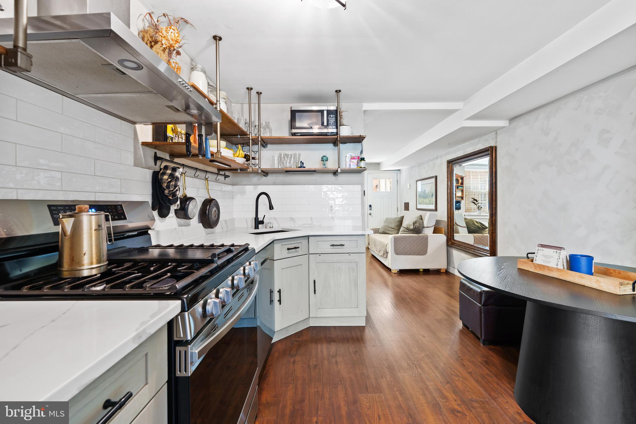 Welcome to 833 Kater St located in Philadelphia’s highly sought after Bella Vista neighborhood. Situated within the Meredith School catchment one of the city’s best public schools, this home is tucked away on a quiet, tree-lined street and is so close to everything Bella Vista has to offer. Enjoy the convenience of being one block from South Street and just a three-minute walk to the famous Angelo’s Pizzeria. This beautifully renovated home offers expansive living spaces designed for comfortable everyday living and effortless entertaining. Newly renovated within the last three years, the residence features 2 bedrooms, 2.5 bathrooms, 1,000+ sq. ft. of living space, and three outdoor spaces Step inside to an inviting open concept layout with a renovated kitchen and newer stainless-steel appliances, along with a convenient powder room on the first floor. From there, step out to a cozy covered backyard perfect for relaxing or hosting. Upstairs, you’ll find a full hallway bathroom and a spacious primary bedroom that easily accommodates a king-size bed. The rear of the home includes a private balcony with skyline views. On the third floor, discover an additional large bedroom with its own rear deck and even better skyline views, plus an adjacent hallway area ideal for storage and a full bathroom. Downstairs, the partially finished basement offers plenty of room for storage and includes a washer and dryer. Perfectly positioned near Palumbo Park. steps from neighborhood cafés, acclaimed restaurants, and quick access to Center City. Contact the listing agent for more details.
