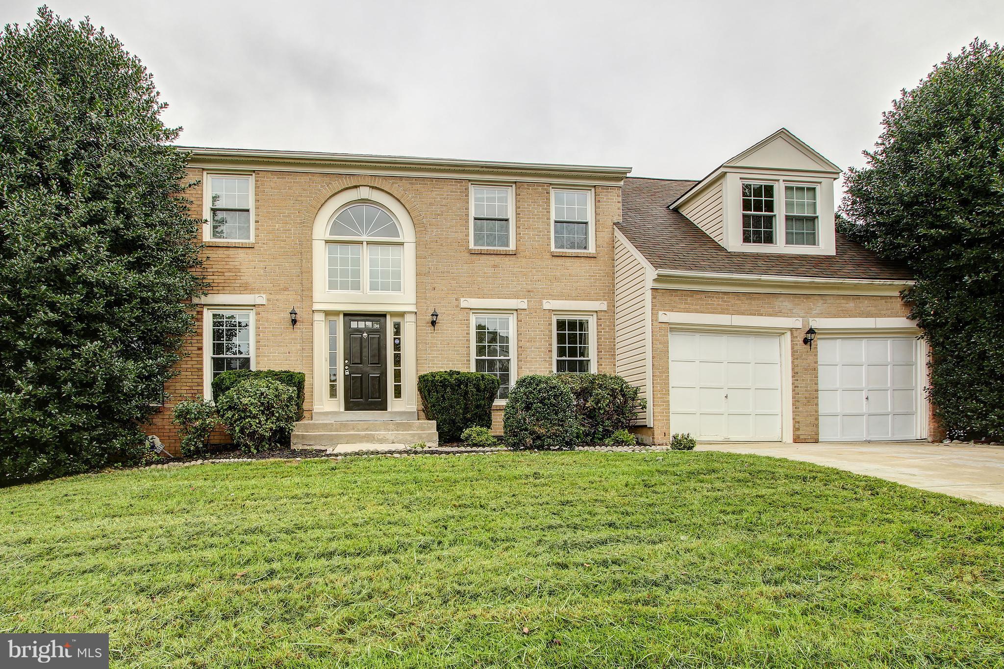Gorgeous Brick-Front Colonial on Corner Lot! Ultra Spacious Home features Wood Floors on Main Level, White Kitchen w Granite, Stainless & Island, Breakfast Room, Main Level Ofc, Fam Room w Skylights Opens to Deck. Upper level w Expansive Master Suite & Generously-Sized Rooms. Walkout Lower Level w Full Bath, Rec Room & 2 Dens. Fresh Paint, New Carpet. Pool, Tennis, Lake & More! Any offers 9/17 5PM