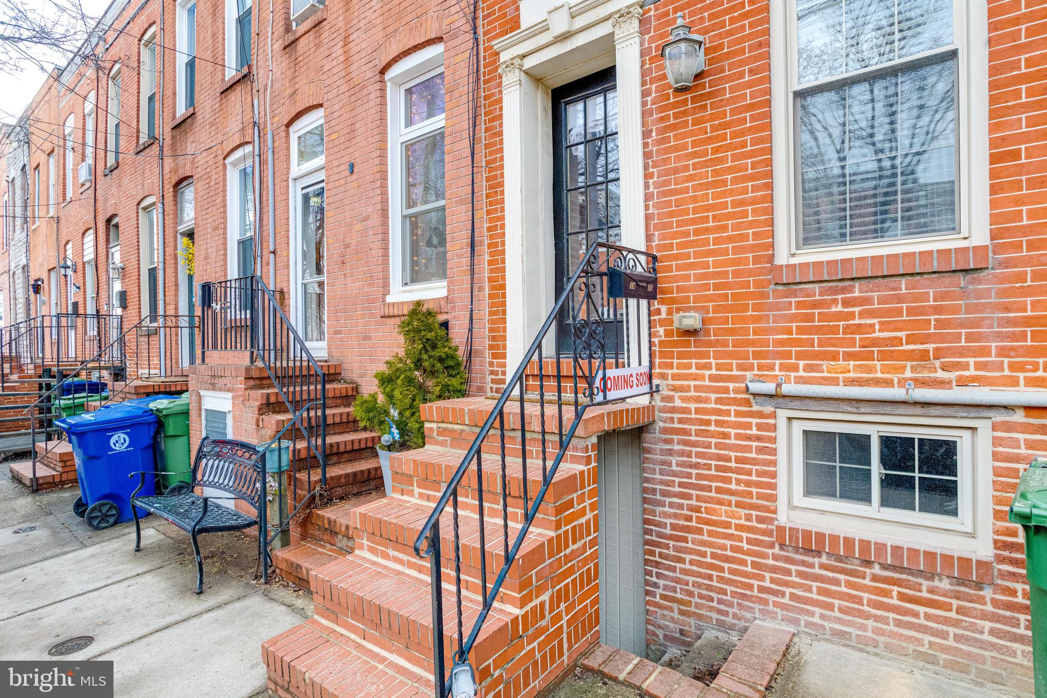 ADJUSTED TO SELL! OPEN HOUSE Friday MARCH 28th FROM 4-6 PM. OPEN HOUSE MARCH 29TH FROM 1-3PM. Discover this charming 3 bedroom (1 in the basement level), 2 1/2 bath row home nestled in the lively Locust Point neighborhood. This fully updated home features around 1,400 SF of finished living space ! You'll love the open floor plan on the first level with sophisticated crown moldings and kempas hardwood floors throughout, this home offers both elegance and comfort. Entertain in your recently updated kitchen with SS appliances, granite and new lighting. The primary and guest bedrooms each come with modernized en suite full bathrooms. Additional conveniences include a main level powder room and laundry and roomy walk-in closets upstairs. Ideally situated near top-rated schools like Digital Harbor High and Francis Scott Key Elementary/Middle and just a short stroll from shopping at Southside Marketplace. Unwind at Fort McHenry National Monument or simply cross the street to enjoy Latrobe Park and the vibrant community. This home seamlessly blends comfort with convenience.