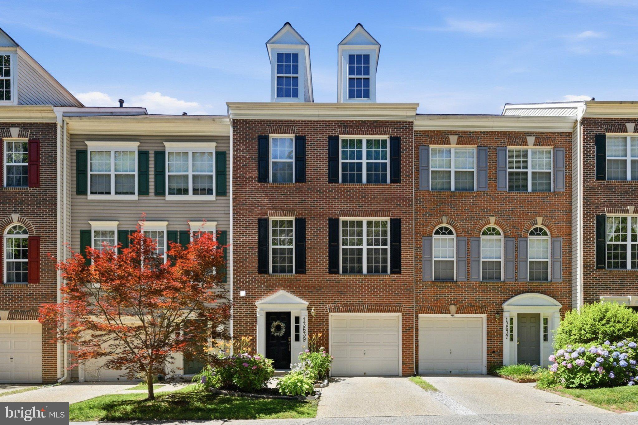 Beautifully maintained and move-in ready, this brick-front townhome in the desirable Autumn Glen community offers over 2,100 square feet of finished living space across three levels. Freshly painted throughout with brand-new carpeting, this home offers the perfect blend of comfort and space, with the opportunity to personalize and make it your own

One of the first things you'll notice is how bright and inviting the main level feels. The spacious living room offers plenty of room to spread out, while the kitchen flows seamlessly into the dining area, making everyday living and entertaining easy. Featuring a gas stove, ample cabinet and countertop space, and a functional layout, the kitchen is both practical and easy to work in.

Just off the dining area, the bump-out is one of the home's most versatile spaces. Whether you envision a sunny breakfast nook, cozy reading corner, coffee station, home office, or additional sitting area, this flexible space easily adapts to your lifestyle while overlooking the backyard. The existing exterior door also offers the opportunity to add a future deck if desired.

Upstairs, you'll find three generously sized bedrooms, including a spacious primary suite with an ensuite bath featuring updated flooring. The beautifully renovated hallway bathroom adds a fresh, modern touch to the upper level.

The finished walkout lower level features a cozy gas fireplace, a spacious recreation room, direct access to the fully fenced backyard with a stone patio, and rough-in plumbing for a future bathroom, offering additional potential for customization.

Outside, the beautifully landscaped front yard welcomes you home with mature landscaping and colorful seasonal blooms that create exceptional curb appeal. An attached one-car garage and private driveway provide added everyday convenience.

Ideally located near shopping, restaurants, parks, major commuter routes, and the Germantown MARC Station, this home offers both comfort and convenience for everyday living. According to the current Montgomery County Public Schools boundary assignments, the property is currently assigned to Northwest High School. Buyers are encouraged to verify school assignments directly with Montgomery County Public Schools.