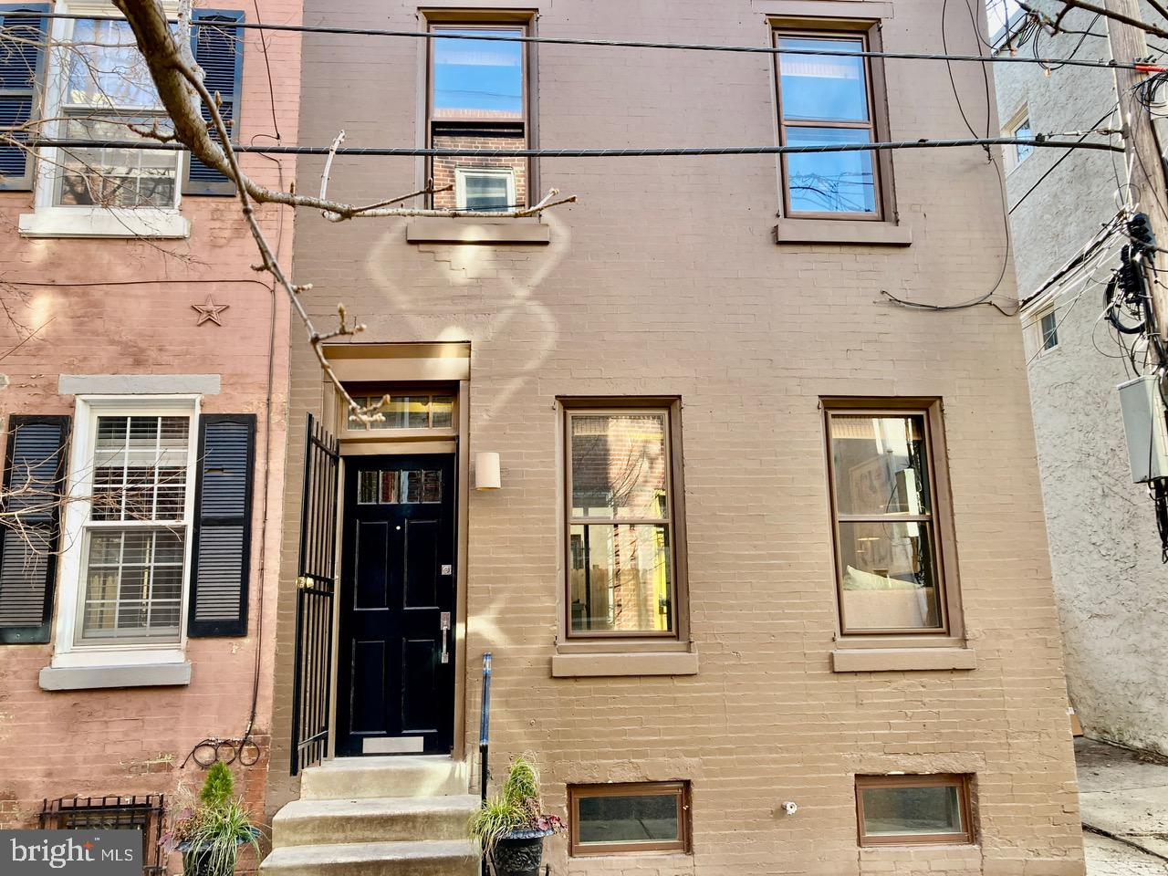 Welcome to 1538 Rodman Street, a beautifully designed and professionally decorated residence nestled on one of Philadelphia's most desirable tree-lined blocks in the heart of Rittenhouse Square. Combining timeless charm with modern luxury, this thoughtfully appointed home offers an exceptional lifestyle just moments from the city's finest dining, shopping, and entertainment.

The inviting interior features a bright eat-in kitchen complete with premium appliances, including a built-in Miele coffee maker, perfect for your morning routine. The luxurious bathroom showcases a custom oversized king-sized walk-in shower, while the unique lofted primary suite with a convenient half bath creates a private retreat. Additional upscale features include automatic room-darkening shades, central heating and air conditioning, a front-loading washer and dryer, dishwasher, and garbage disposal for effortless everyday living.

Step outside to your private south-facing brick patio—ideal for relaxing or entertaining—or head up to the furnished rooftop deck, where breathtaking Center City skyline views provide the perfect backdrop for morning coffee or evening gatherings.

Located just steps from the restaurants, cafés, and boutiques of South Street and South Broad Street, you'll enjoy neighborhood favorites such as Mile's Table, Rex at the Royal, Jet Wine Bar, The Breakfast Den, Suprema Coffee Roasters, and Self Embodiment Fitness, while being only a short stroll from the green open spaces of Rittenhouse Square. Offering sophisticated finishes, outdoor living, and an unbeatable location, 1538 Rodman Street is an exceptional opportunity to experience the very best of city living.