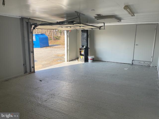 CONVENIENTLY LOCATED GARAGE WITH UTILITIES INCLUDED!  This spacious and clean garage is located behind 7510 Belair Rd.  Dimensions are 26ft x 16ft, has heat, and we are working on getting electric installed.  Perfect for someone looking for a small workspace or a contractor looking for storage.  Located minutes from 695!