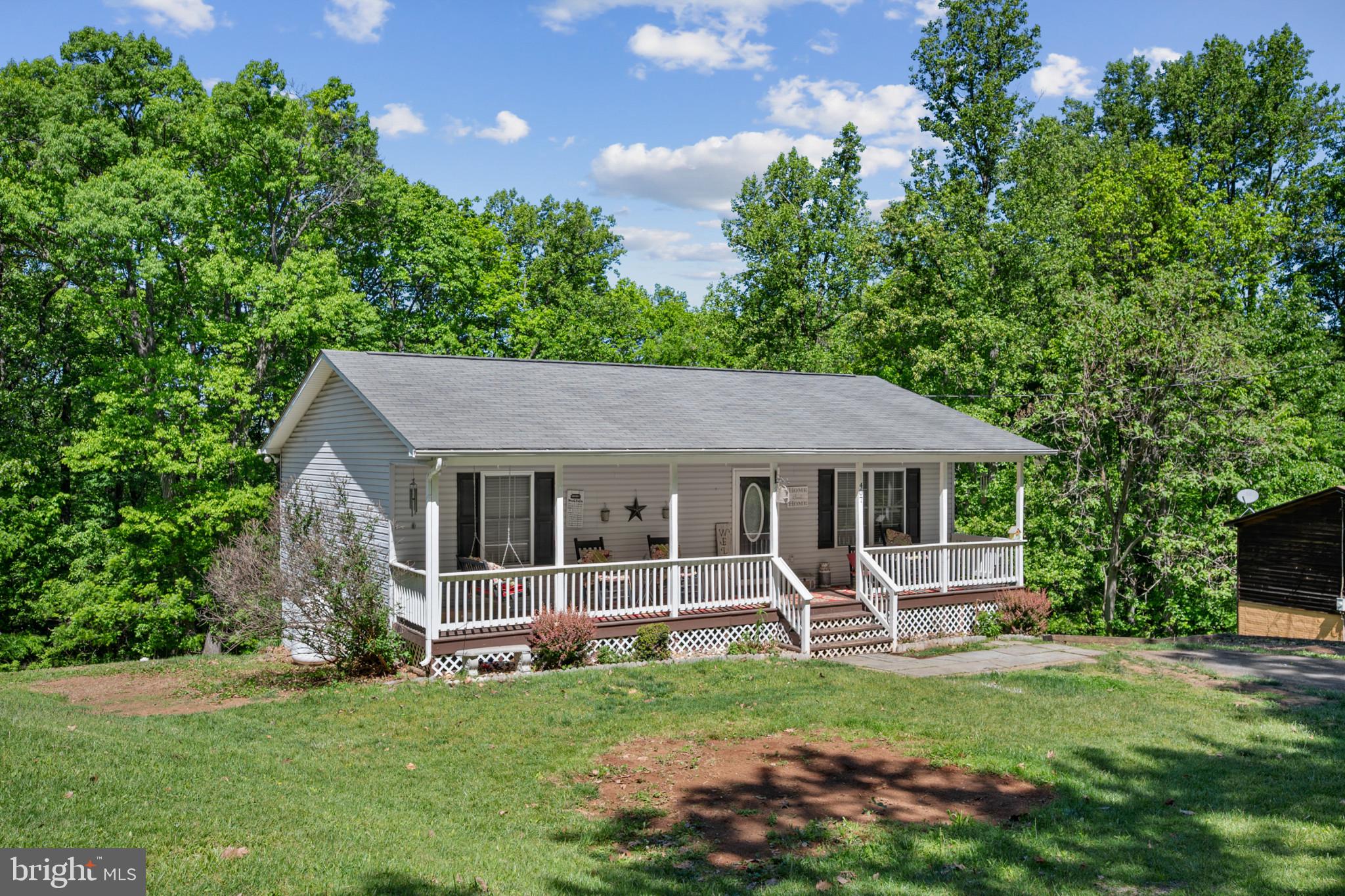 NEW CARPET INSTALLATION & FRESHLY PAINTED - $10,000.00 PRICE REDUCTION + $8,000.00 BUYER CREDIT!! Check photos for recent updates!
Charming ranch-style home nestled on a peaceful setting in Linden, VA. Offering over 1,700 sq ft on two finished levels, this home features a finished walkout basement with additional living space and flexible room options. Enjoy the welcoming front porch, spacious yard, and recent updates, including renovated kitchen, newer flooring, and screen door installed within the last three years. Septic system serviced within the last two years & well pump serviced approximately one year ago. Gutters recently cleaned. Conveniently located with easy access to I-66, wineries, hiking trails, and Shenandoah attractions. A great opportunity for buyers seeking comfort, privacy, and country charm.