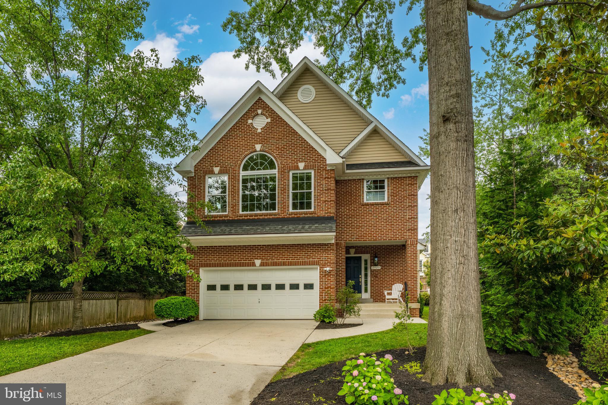 Beautifully updated and thoughtfully designed, this exceptional 4-bedroom, 4.5-bath home offers the perfect blend of comfort, elegance, and functionality. Nestled on a quiet street in one of Arlington’s most coveted neighborhoods, the home boasts a versatile floor plan ideal for both everyday living and effortless entertaining—indoors and out.

Flooded with natural light, the spacious main level features oversized windows adorned with timeless plantation shutters, an inviting wood-burning fireplace, and an open-concept layout that flows seamlessly throughout. The gracious foyer opens into a stylish living area that includes a family room and a flexible space that can serve as a formal dining area, music room, or additional lounge. Privately tucked off the foyer is a dedicated study—perfect for working from home.

At the heart of the home lies the newly renovated chef’s kitchen, a culinary dream outfitted with stunning Calacatta Mirragio stone countertops, an extended island for seating and prep, a BlueStar range top, GE dual wall ovens, Bosch dishwasher, and a dual-compressor refrigerator. The spacious breakfast nook offers picturesque views of the beautifully landscaped backyard.

Step outside to a private, fully fenced retreat featuring a custom flagstone patio with distinct dining and lounge zones, a grilling station, and a stone seat wall—ideal for hosting or relaxing under the stars.  With an inground sprinkler system making for easy maintenance.

Upstairs, the expansive owner’s suite offers a peaceful escape with treetop views, two generous walk-in closets, and a luxurious en suite bath complete with a soaking tub and walk-in shower. Three additional bedrooms and two full baths complete the upper level.  The laundry room is conveniently located on the upper level. 

The fully finished lower level offers incredible flexibility with a large recreation room featuring a custom Murphy bed, built-in shelving, and ample storage. A full bathroom and private home gym round out the space—ideal for guests, play, media, or fitness.

Additional highlights include a generous pantry, a mudroom, and an attached two-car garage. Zoned for top-ranked Discovery Elementary, Williamsburg Middle, and Yorktown High School, the home is also just minutes from Washington, D.C., Tysons, and Great Falls. Enjoy easy access to the shops and restaurants of Lee-Harrison Shopping Center, scenic parks, miles of trails, and the charm of Westover Village.
