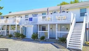 $199k Oceanblock across from convention center! EARN when you purchase with easy and new rentals for 2026 season!  It is supposed to be a very strong summer here, Almanac says many sunny hot days to come for this year! Bring Your Offers!  Easy to visit Investors  this unit is ready for 2026 Rental Season!  1 bedroom has been  completely updated and ready to rent!  These do really well in summer and for events!!!  What an Adorable & Spacious 1 bedroom -Lower Level access for easy unloading!  Modern, Clean &  Fully Furnished, Low Condo fees, Walk to SO MANY ATTRACTIONS!  
Have your early morning stroll on the beach,  or wine down time on your Huge  Porch with Summer Sea Breezes!  Not only are you Ocean Block but it is conveniently located  across the street from the Convention Center,  which is now a fulltime destination with so many Spectacular New Shows appearing Year Round!  Great Investment opportunity for Short Term Rentals or Long-time residents can enjoy the Turn Key Move in and Local Conveniences, 10 blocks away from route 90 Access!  Don't Miss this Great Value!
