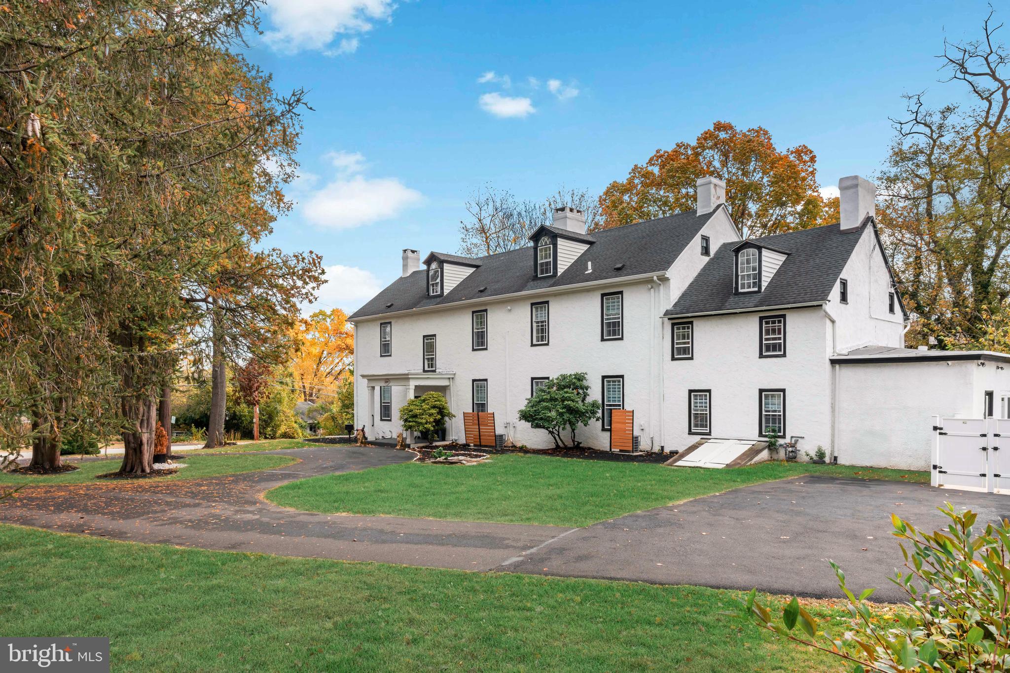 Welcome to Highland Farm Manor, a rare opportunity to own a remarkable piece of history originally built circa 1721. Once one of Abington’s original homesteads on a William Penn land grant, this extraordinary estate has been thoughtfully reimagined for modern living while preserving its timeless character.

This pre-Revolutionary residence has undergone a comprehensive transformation between 2022 and 2023, featuring all new plumbing, electrical, HVAC, and flooring throughout. With seven climate zones, nearly every room offers individualized comfort, and even the main water line to the street has been replaced.

At the heart of the home lies a gourmet kitchen designed for the culinary enthusiast, showcasing top-of-the-line appliances and sophisticated finishes. Offering over 6,000 square feet of living space, the interior is bathed in natural light and adorned with sleek modern touches that harmonize beautifully with the home’s historic charm.

The residence features five luxurious primary suites, each with a private bath, plus two additional bedrooms and a total of 6.5 bathrooms, ensuring exceptional comfort and privacy for residents and guests alike. Additional highlights include a roof less than 10 years old, a private fenced-in pool ideal for summer entertaining, and parking for up to six vehicles.

The two story detached garage presents endless possibilities, with completed plans available for renovation and outdoor enhancements. Accessibility is seamlessly integrated, with an elevator and design features that promote ease of movement throughout the home.

Currently operating as a personal care residence, the property can be easily converted back to a private single family home. Additional amenities include dual central vacuum systems, a hardwired fire alarm system, and a commercial grade dehumidifier for optimal air quality.

Situated in the highly desirable Highland Farms neighborhood, the manor offers unmatched convenience, just steps from restaurants, shopping, and Abington Hospital. Highland Farm Manor perfectly blends historic significance, modern luxury, and everyday comfort in one truly exceptional property.