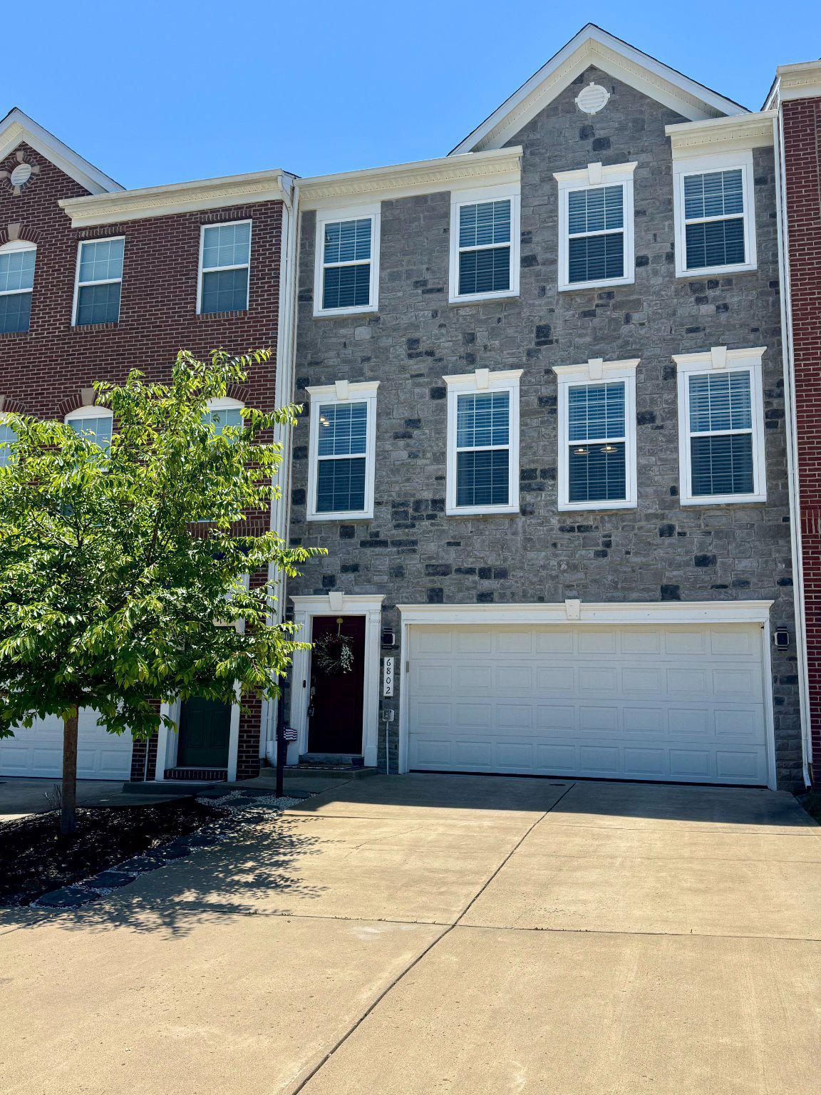 Professional Pictures to be uploaded by COB Friday, June 5th. 

This gorgeous 4-bedroom, 3.5-bath stone-front townhome is located in the highly sought-after Villages of Piedmont II community, just minutes from the town of Haymarket where you'll find plenty of shopping, dining, and highly rated schools! The home is painted in a fresh neutral paint throughout, ready for you to put your own design stamp on it. It features elegant crown molding, rich engineered hardwood flooring, and a very desirable open concept floor plan. The large sun-soaked family room has access to a large back deck and is right off your new gourmet kitchen, which is complete with a chef-sized island, stainless steel high-end appliances, and spacious cabinetry galore. The upper level Primary Suite has a wall of windows which bring in ample natural light and features a huge walk-in closet plus a beautifully tiled ensuite with an oversized frameless glass shower, and of course double sinks and private toilet room. You'll be able to enjoy your morning coffee or evening drinks on the maintenance-free main level deck, or invite friends over to enjoy the built-in stone firepit in the fully fenced-in backyard. The home backs to an expansive common area and is steps away from “LEOPOLD'S PRESERVE,” a 380-acre nature park featuring 7 miles of natural surface trails that are popular for hiking, trail running and walking. Additional premium perks of the home are the upgraded high-efficiency HVAC system, tankless hot water heater, whole-house Honeywell generator, and oversized 2-car garage with epoxy coated floors. As residents of Villages of Piedmont II, you'll enjoy access to two club houses with outdoor pools, playgrounds/tot lots, picnic areas, tennis courts, volleyball courts, basketball courts, pickleball courts and a dog park. Schedule your private tour today before this beauty is snagged up! Please reach out to Cindy Abell, Listing Agent, with any questions!