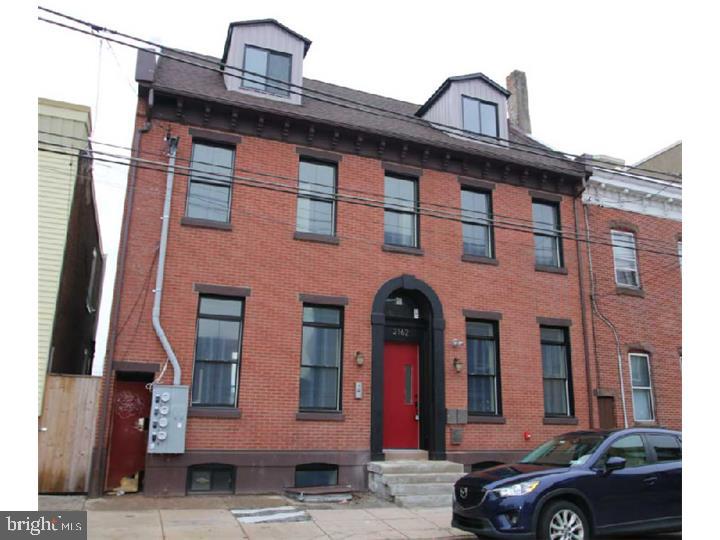 Gorgeous condo unit located on first floor of this spectacular renovation. Entry into common vestibule area to Unit B on the left side. Enter into modern eat in kitchen with island center and seating for 2-4. Quartz counter tops, abundant cabinet space, stainless steel appliances, gas cooking,pantry for additional storage. Washer/dryer are located next to kitchen for convenience. Back door leads out to yard with EP Henry brickwork. 2nd floor features large master bedroom with tract lighting and master bath with all the updated amenities! Ceramic tile floor and tub/shower, Double closet. Lower level features 2 good size bedrooms with full modern ceramic tile bath and hardwood flooring t/o. Storage areas are large and located t/o the unit. Plenty of windows to allow for awesome views and light. Walking distance to many attractions and public transportation