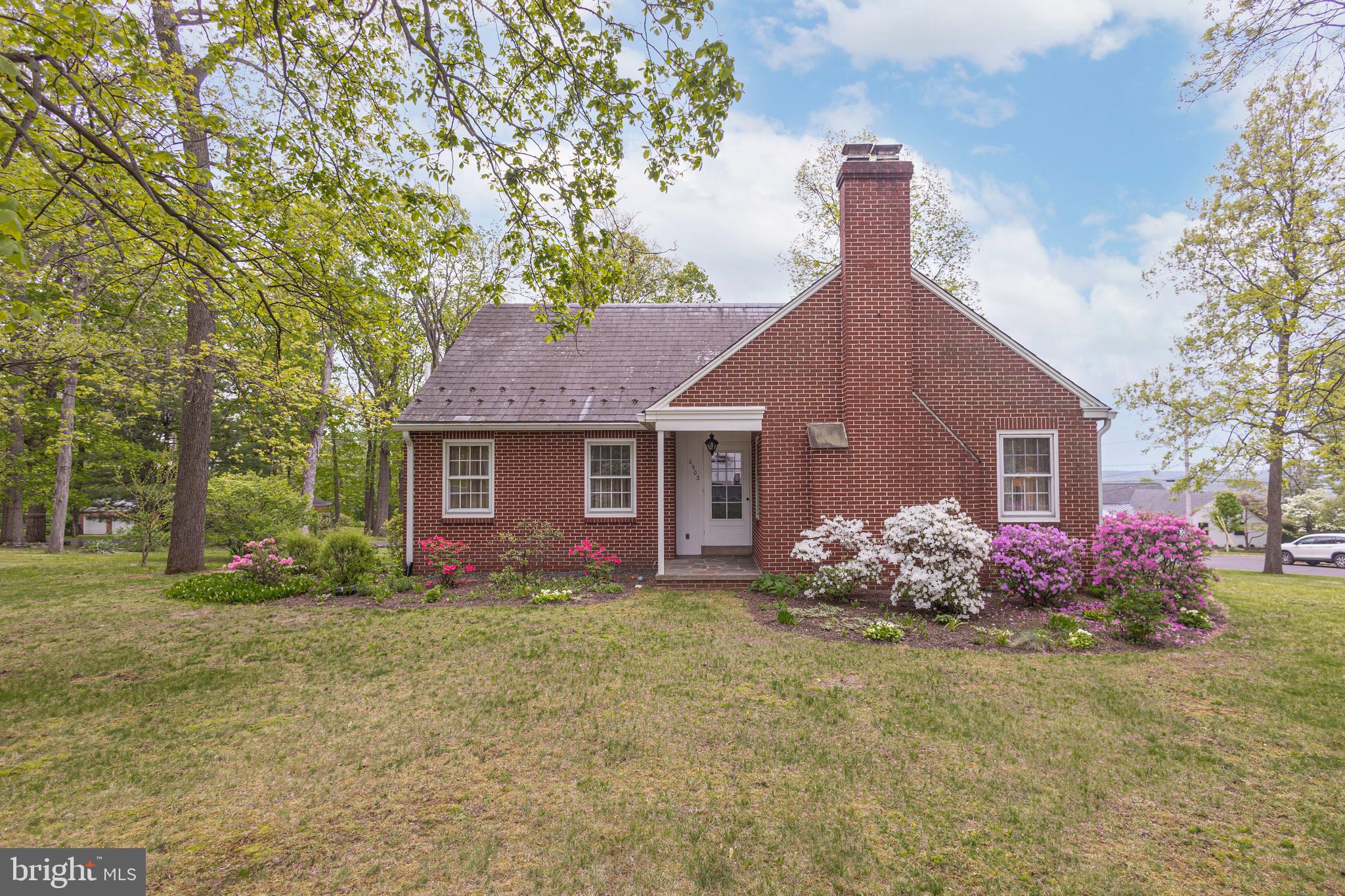 Welcome to this timeless solid brick home offering classic charm, generous living space, and beautiful surroundings. Featuring 4 spacious bedrooms and 2.5 baths, this well-maintained residence combines quality craftsmanship (built by Stanley Horn, so you know the quality) with comfortable everyday living.

Inside, you’ll find gleaming hardwood floors throughout much of the home, adding warmth and character to the inviting interior. The cozy fireplace creates the perfect focal point for relaxing evenings, while the bright and airy sun room offers a peaceful space to enjoy morning coffee, entertain guests, or take in the scenic views year-round.

The home’s stately brick exterior, mature landscaping, and expansive yard provide exceptional curb appeal and a welcoming first impression. With ample living space, classic architectural details, and a desirable setting, this property is ready to become your forever home.