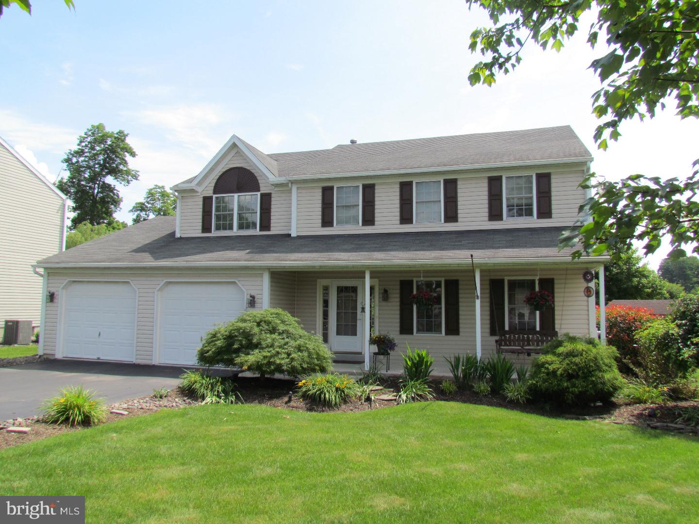 2 story home in excellent condition   Hunters Run, Exeter Twp!  First floor offers an eat in kitchen w/ tile floor, living room, dining room, family room & powder room all with gorgeous hardwood floors; sliders off kitchen lead to 2 year old stamped concrete patio and private rear yard w/ shed; Second floor offers 4 bedrooms, 2 full baths and second floor laundry;     SF Lower level is finished with a built in bar and exercise room; Other features include a security system, 2 car attached garage, covered front porch and storage above garage.