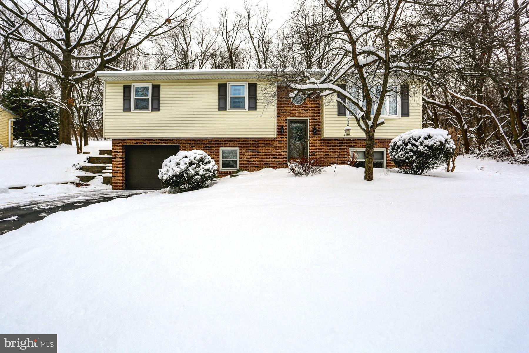 Love & Care are the hallmarks of this beautiful 3 BR home.  Carefully maintained and situated on a cul de sac street this home  has many updates including a remodeled kitchen with silestone countertops & new flooring, updated baths, newer roof and triple pane windows ,  and newer hot water heater .  Home also offers 3 Full baths, finished lower level with option of a 4th BR or study and a 1 car garage.  Privately nestled against wooded area and close to all amenities (Shopping, restaurants, schools and highways).  The screened in porch is a perfect spot to enjoy your morning coffee or just to relax after a long days work.   Seller is also offering a 1 year home warranty for peace of mind.  Don't delay, this one won't last long!