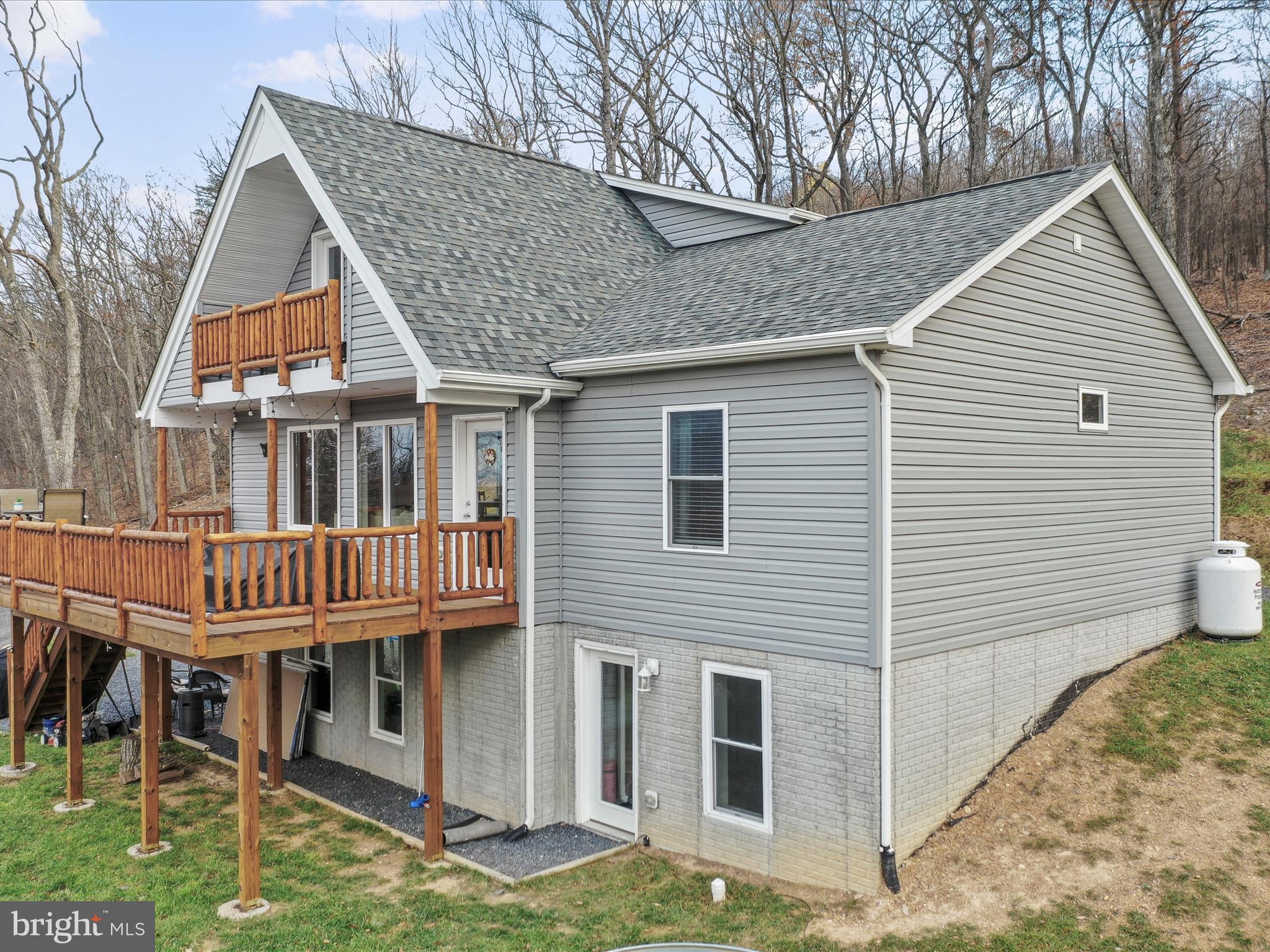 Pictures will be uploaded November 25th. Nestled in the heart of the Shenandoah Valley, this home offers million dollar views that will take your breath away. Enjoy the scenic vistas from not one but two decks with log railings. The home features 4 Bedrooms and 2.5 Baths.  The spacious master en suite situated on the upper floor with office and nook area and access to private deck.  The finished basement provides additional living space w/ pellet stove for warm and cozy area. This unique home is a must see, you won't be disappointed.