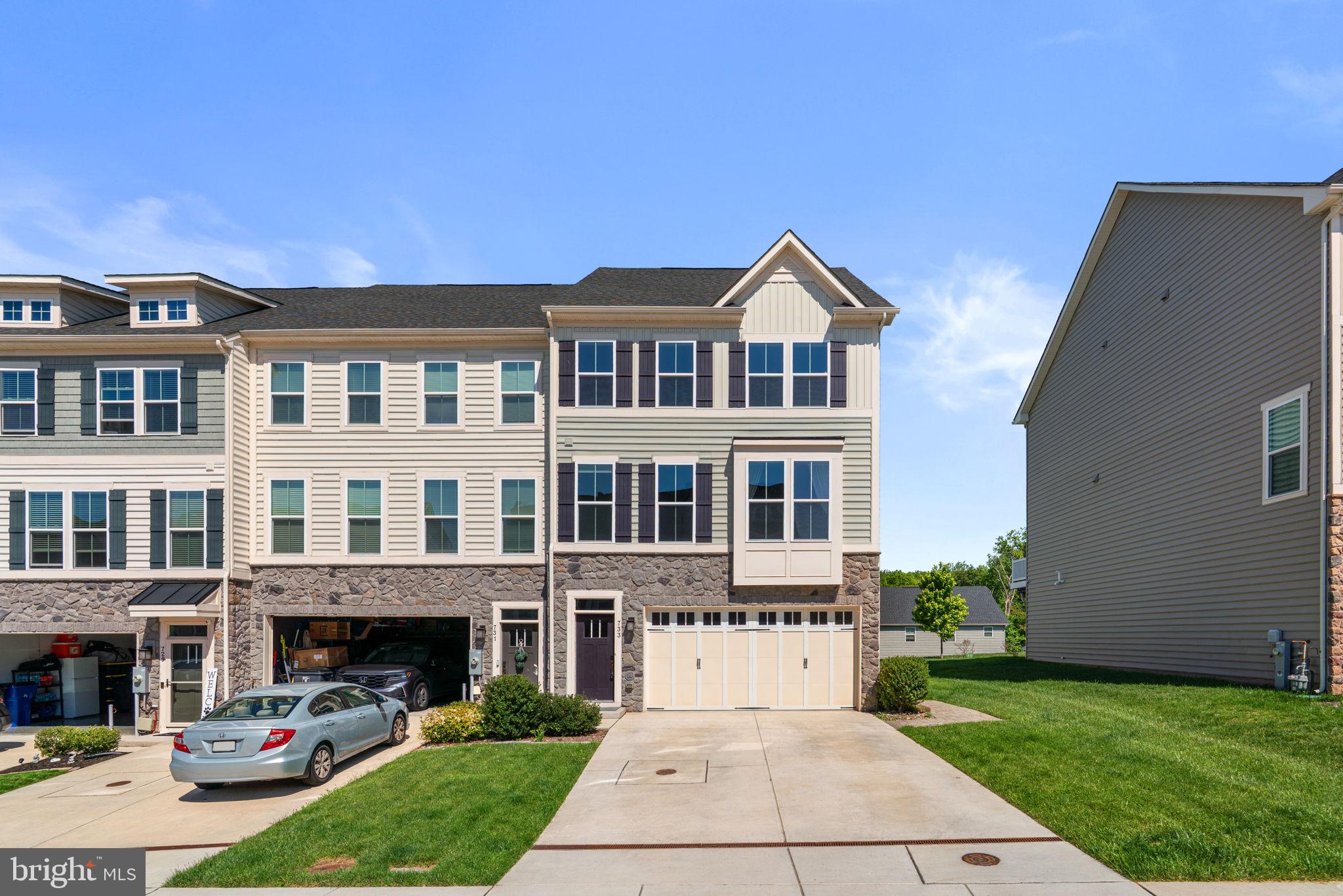 Welcome to this beautiful 3-bedroom end-unit townhome filled with natural light thanks to the additional windows only an end unit can offer. The bright and open main level features a gorgeous kitchen with stainless steel appliances, including a gas range with microwave rangehood, a large center island with breakfast bar seating, and a Reverse Osmosis water system for added convenience. The adjacent dining area includes a door leading to the deck, creating the perfect setup for indoor-outdoor living and entertaining. A dedicated home office nook just off the kitchen provides ideal flex space for remote work or studying, and a convenient half bath completes the main level.


Upstairs, you'll find a thoughtfully located laundry nook along with three spacious bedrooms and a full hall bath. The owner's suite features a large closet and a private ensuite bathroom with double vanities.


The lower level offers exceptional versatility with a full bathroom, garage access, and a large finished room with access to the rear patio and fenced backyard—perfect for a second family room, home gym, guest suite, or media room.


Additional highlights include a 1-car garage and numerous recent upgrades, including an LG front-load washer and dryer installed in March 2025, a Maytag dishwasher installed in May 2025, and new GE kitchen appliances—including a range with Air Fry feature and microwave—installed in April 2026. This move-in ready home combines style, function, and thoughtful updates throughout. Mortgage savings may be available for buyers of this listing.