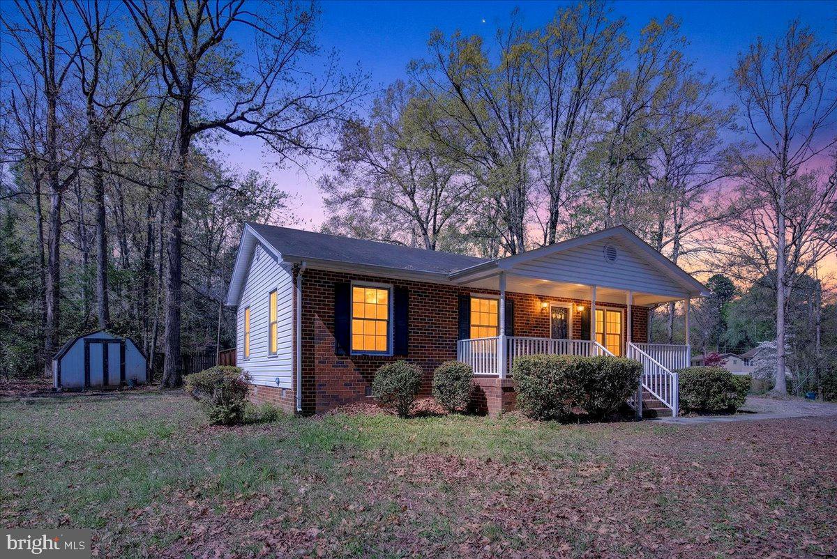 Back on the market due to buyer financing falling through. Their loss is your opportunity.

Nestled within the sought-after Lake Caroline community, this charming home offers something buyers are struggling to find today: affordability, functionality, and access to an incredible lifestyle.

Step inside and you'll immediately notice how spacious the home feels. Warm hardwood floors flow throughout the main living areas, while natural light fills the space and creates an inviting atmosphere from the moment you walk through the door. An arched doorway adds character and architectural interest, setting this home apart from the ordinary.

The living room offers a comfortable gathering space that feels open yet welcoming, making it equally suited for quiet evenings at home or entertaining family and friends. Just beyond, the kitchen provides ample cabinet storage, practical workspace, and an easy connection to the living areas that keeps everyone part of the conversation.

With two bedrooms and one full bath, the layout is efficient, comfortable, and ideal for first-time buyers, downsizers, weekend lake enthusiasts, or anyone looking for a smart investment in a growing community.

Outside, the oversized rear deck expands your living space and creates the perfect setting for morning coffee, summer cookouts, or relaxing evenings under the stars. Positioned on a corner lot, the property offers additional yard space, privacy, and room to enjoy the outdoors.

But the real magic is the lifestyle that comes with Lake Caroline ownership. Residents enjoy private lake access, a sandy beach, swimming pool, basketball courts, playgrounds, picnic areas, and year-round recreational opportunities. Whether you're spending the day on the water, meeting neighbors at community events, or simply enjoying the peaceful surroundings, Lake Caroline offers far more than just a place to live.

Homes at this price point with access to amenities like these are becoming increasingly difficult to find. If you've been waiting for an opportunity to enjoy lake community living without the waterfront price tag, this is one worth seeing.

The previous buyer's financing fell through. The home did not. Now it's ready for its next owner.
