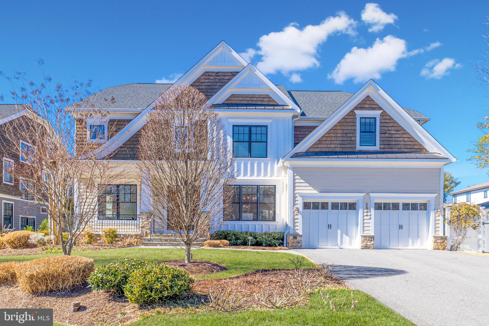 Welcome to this exceptional Arts and Crafts residence with 6,300 SF of living space built by the esteemed Georgetown Homes with extreme attention to detail, quality craftsmanship, and high-end finishes throughout! This property features a tremendous amount of natural light, luxurious spaces, and modern technology that combine to deliver the epitome of warmth and ideal living in this impeccable home.   
 
This property offers numerous recent updates such as newly refinished floors, designer lighting, new paint, and includes Hunter Douglas window treatments and a whole home Lutron lighting system with options for personalized settings and remote programming. Enjoy the built-in speaker system throughout the home, along with a Sonos system and Control 4 for media, which make this the ideal property for every day and entertaining.
 
This true chef’s kitchen features top-of-the-line appliances, as well as marble countertops, a farmhouse sink below the windows, prep sink in the island, a picturesque breakfast space with a custom built-in bench - all with walls of windows that brings the beauty of the professionally landscaped yard into the home for year-round enjoyment. The family room boasts a gas fireplace and glass doors to the ideal outdoor kitchen space that includes a Wolf grill, ample counter space, and room for other chef's elements. The steps below lead to a flagstone patio and a large, flat yard, which is stunningly lit with extensive landscape lighting throughout.

Completing the main level, which boasts 10-foot ceilings, is a bespoke dining room with a designer lighting, extensive wall paneling, and a butler's pantry; formal living room; main level office or bedroom with an en-suite bathroom; formal powder room; and a mudroom with two closets, bench with cubbies, plus a smart-locking door to the two-car garage. 

Respite awaits on the upper level in this stunning primary suite featuring a large sitting area offering flexibility in uses, a high efficiency ceiling fan, and stunning window treatments throughout the room. The luxurious bathroom greets you with heated floors and designer lighting, marble counters, a true soaking tub, towel warmer, and a custom closet with numerous upgraded features. There is an additional bedroom suite with a generously sized closet and en-suite bathroom, along with two additional bedrooms with a connected bathroom, a laundry room with stone countertops, cabinetry, as well as a linen closet located in the hallway. 

The lower level offers an expansive recreational space that flows into additional living space creating opportunities for a myriad of uses and enjoyment. Additionally, the lower-level bar features a full-sized SubZero wine refrigerator, two refrigerator drawers, sink, and marble countertops.  Entertaining spaces expand into the dedicated game room, which includes pre-wiring throughout making it an ideal theater room. Bedroom 6 is located on this level and boasts a large walk-in closet, wood floors, and pre-wiring for a TV. The lower level is complete with a glass side door to the walk-up stairs to the rear yard. 
 
Truly a timeless and refined home sited on a manicured, south-facing one-third acre lot with mature landscaping, lighting, and irrigation system. This location is the epitome of convenience and luxurious living, just steps to all that downtown McLean has to offer, minutes to the Capital Beltway, GW Parkway, Tysons, as well as access to the natural beauty of nearby parks and trails.