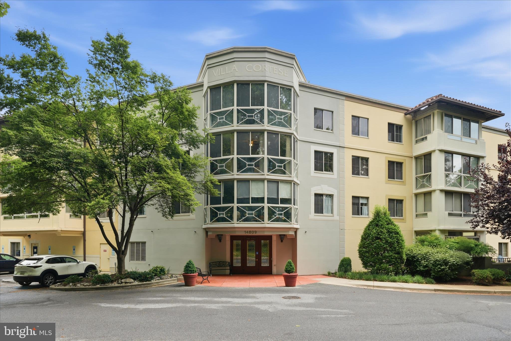 ***GARAGE PARKING AND STORAGE UNIT INCLUDED*** Welcome to 14908 Pennfield Cir. Villa Cortese! This area is unique and private in the desirable Villa Cortese location The Leisure World Community. Enter the building into the double secure foyer and find elegance, charm, and rich decor. Take the elevator to the top 4th floor and wonder only two doors down to find unit #402. Then proceed in to find a spacious two bedroom, two full bathrooms condominium. Bright beautiful kitchen with stainless steel appliances, & new in-sink water filter. Primary bedroom with en-suite bathroom & walk-in closet. New stackable washer/dryer. This condo is ready. Step out of the sliding glass doors into the 4 season sunroom and enjoy the views. After visiting the condo head down to the parking garage. The condo is sold with separate storage and it's own parking spot. The storage unit is located in a locked room on the garage level. On the way to the storage room glance over at the oversized parking space #15. This garage assigned space is the very first space next to the interior doors that lead to the elevators. Comes with garage remote for easy car access. The building offers a community room reserved for the residents of The Villa Cortese for joining in on social occasions, events and monthly scheduled activities. Building has a brand new roof. Leisure World is a 55+ secured and gated community. The community offers an art studio, woodworking shop and library. Also has a state of the art fitness center, indoor and outdoor pool, 18 hole golf course, courts, restaurants and bar. Some conveniences found in Leisure World are on site medical, grocery store delivery, dental center, post office and more. Shuttle transportation is provided to and from the building door to nearby shopping. So come and be as active as you like or just sit back and enjoy the views from your beautiful, low maintenance, bright, open, and cozy condo!