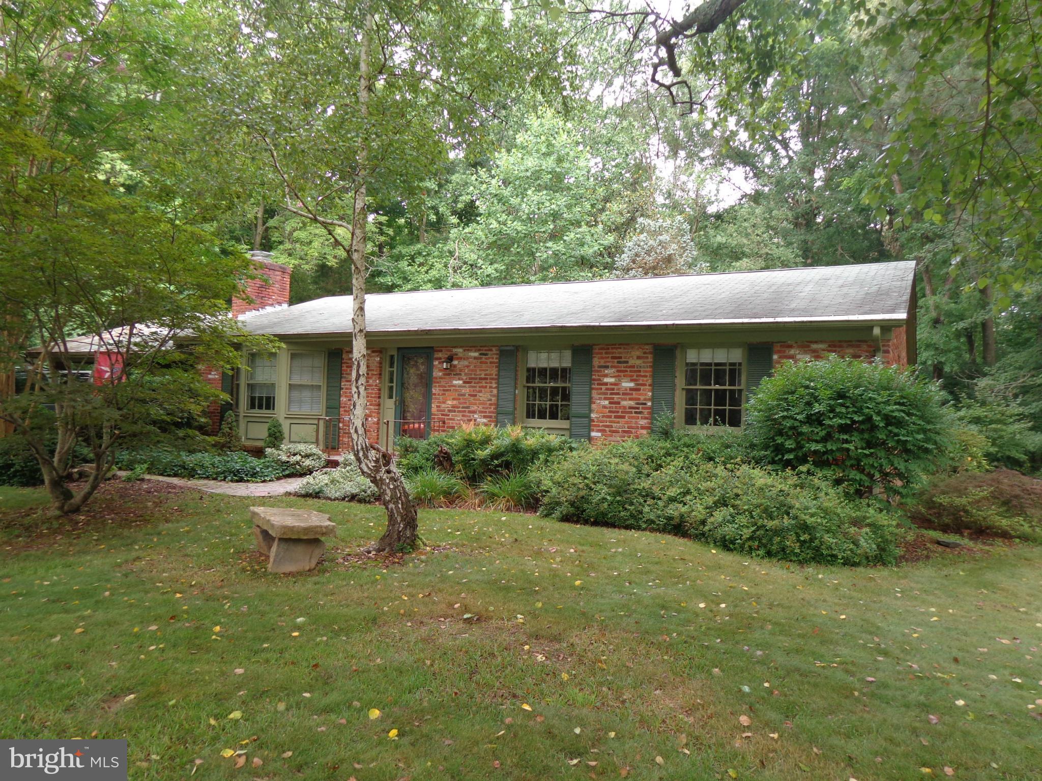 Charming 3BR rancher on large wooded property in quiet neighborhood of MariEllen Park.  Home has hardwood floors, a fireplace, and a carport.  In the back is a shed and trellised patio.  Plenty of off-street parking.  Close to downtown La Plata.  Public water with no town taxes.  Home has not been updated but can be a gem with some tender loving care.