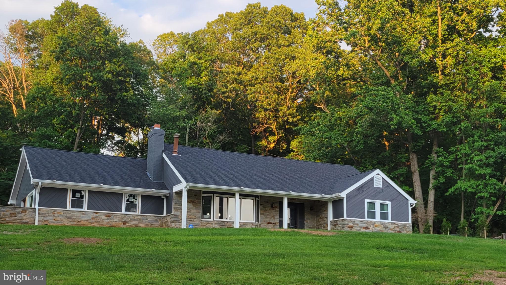 A rare opportunity to own a renovated single-family home in one of Greenspring Valley’s most distinguished settings.

Nestled at the end of a quiet cul-de-sac on 1.12 wooded acres, this beautifully renovated five-bedroom home is located in the sought-after Rainbow Park community—an enclave within Greenspring Valley whose identity is closely tied to the nearby historic Rainbow Hill estate, once the residence associated with General Douglas MacArthur and his family. This setting reflects the enduring prestige and legacy that have long defined this celebrated corner of Baltimore County.

Surrounded by mature trees and natural landscape, the property offers a rare sense of privacy and seclusion while remaining conveniently close to everyday amenities. The setting evokes the feel of a private country retreat, enhanced by extensive modern renovations that allow for effortless contemporary living.

Designed for both comfort and entertaining, the home features a highly desirable first-floor owner’s suite, spacious secondary bedrooms, and flexible living spaces that adapt easily to a range of lifestyles. At the center of the home is a fully renovated gourmet kitchen featuring an impressive granite island, double wall oven, beautiful appliances, and generous space for gathering and connection.

The open space family room provides a warm and inviting atmosphere with a wood-burning fireplace, a dramatic bay window, and built-in seating overlooking the peaceful, wooded backdrop. Upstairs, three generously sized bedrooms—including two large enough for king-sized furnishings—are complemented by a versatile bonus room ideal for a media space, home office, fitness studio, playroom, or creative retreat.

Outdoor living is equally exceptional. A beautiful in-ground pool anchors the backyard, surrounded by expansive entertaining areas, fenced grounds, and a growing natural buffer of more than 25 evergreens, creating a tranquil outdoor space.

Significant improvements completed since 2020 provide peace of mind and long-term value, including a new roof, all new windows, updated electrical and plumbing systems, high-efficiency furnace, whole-house water filtration system, electric tankless water heater, upgraded pool systems, fresh interior paint, new carpeting, a new retaining wall, and a newly completed driveway.

Homes in Rainbow Park are seldom available. This is a unique opportunity to own a fully updated residence in a setting defined by character, warmth and charm. Welcome Home...
