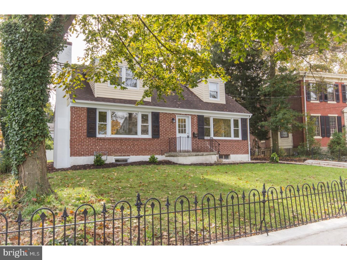 Great curb appeal on a tree lined street is where you'll find this nicely updated cape cod with a 1st floor bedroom, full bath and laundry room which makes this the perfect one floor living situation if that's what you need. Dark walnut stained hardwood floors throughout. The living room is large and offers a large bay window and stone wood burning fireplace, perfect for hanging your Christmas stockings!  The NEW kitchen with maple cabinetry, granite counter tops and tiled backsplash with ceramic tiled floors is very inviting and opens to the dining room which makes this the perfect entertaining space.  Off the kitchen is the mud room/laundry room and down the hall from the kitchen is a nice sized bedroom and a full bath, which is completely NEW.  Upstairs are 2 very generous sized private bedrooms with ample closets and a small carpeted bonus room off one of the bedrooms.  This could be the perfect nursery, office or hobby room.  There is also a full bath on this level, which just like the 1st floor full bath and kitchen have been totally gutted and is completely NEW.  The finished lower level family room provides even more living space!  The back yard is large and flat and the driveway provides for plenty of parking for the entire family and friends.  Put this one on your must-see list!