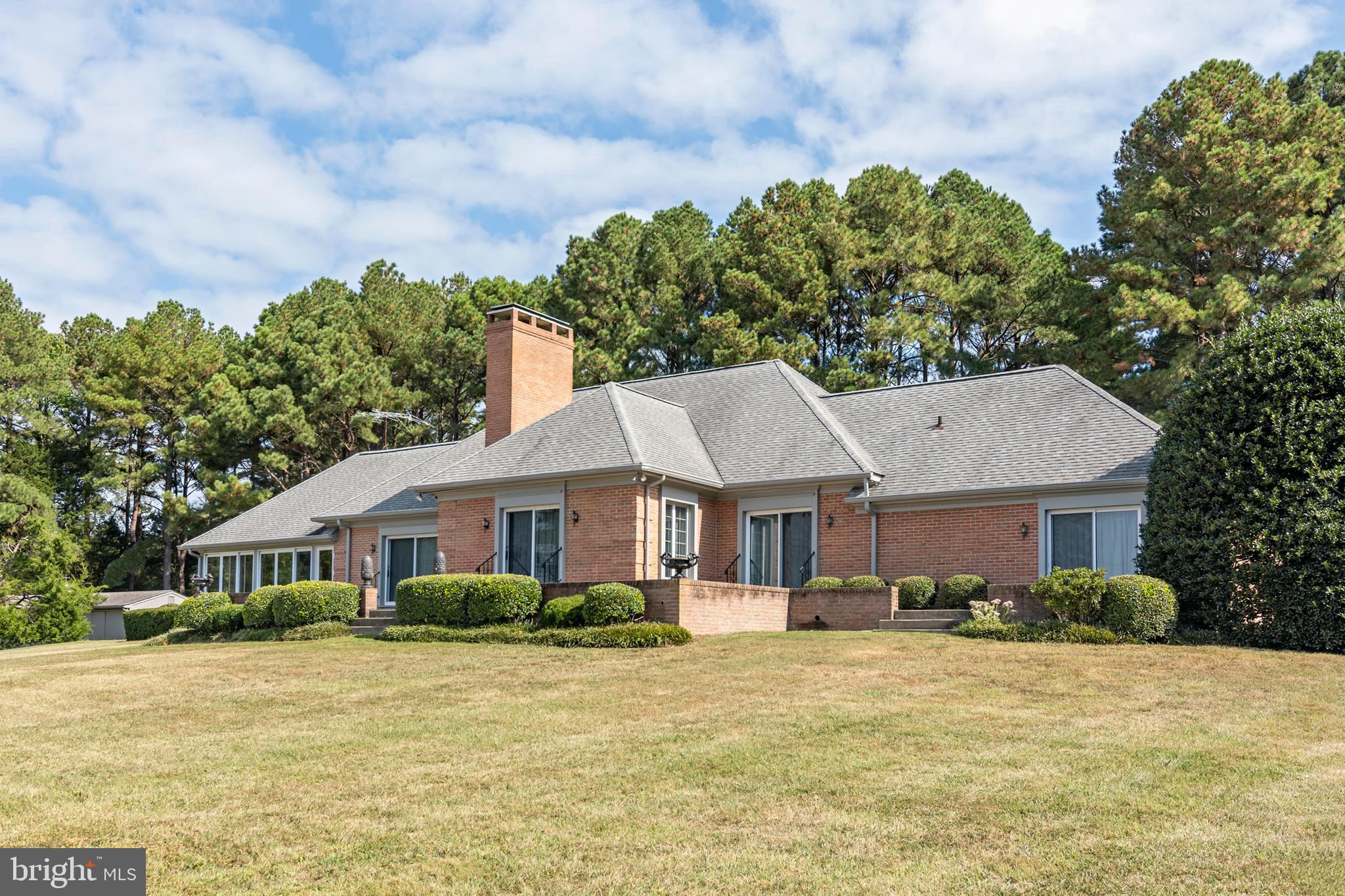 Welcome to Holly House!  This extremely well-constructed French provincial style one story brick residence proudly sits on a 5 acre spectacular Miles River waterfront lot.  Enjoy broad water-views and breathtaking sunsets .  Property amenities include a waterside pool; pier; rear terrace; tennis court and an oversized outbuilding.