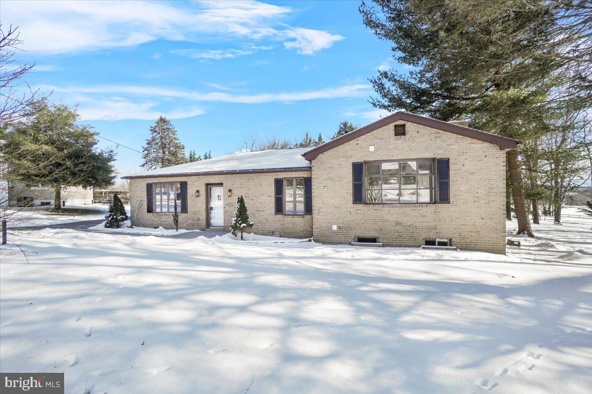OFFERS DUE TODAY, SATURDAY, FEBRUARY 15th  AT 5:30 PM!  Welcome to 5935 Meadow Road in Frederick.  An unbelievable opportunity to own a fully renovated house situated on over .66 acres in the Oakdale School District, less than two miles from downtown Frederick.  All systems are new, HVAC, Roof, LVP flooring, recessed lighting, and the list goes on!  All brick two-level rancher checks many homebuyer boxes with main level living. The home features a spacious, open floor plan with bright living areas, an updated kitchen (with granite, stainless steel appliances), a primary suite offering a private retreat with an en-suite bathroom for ultimate relaxation, second bedroom and third bedrooms utilize the full hall bathroom, stackable front-loading washer/dryer complete the main level; lower level offers an office or den, a full bathroom, and a recreation room with glass slider to outside.  Step outside to the large outdoor private backyard backing to trees, 2 sheds, oversized blacktopped driveway for additional car parking.  The property combines the best of country living with easy access to nearby amenities. New HVAC and New Roof, and the list goes on.  Nothing to do but move in!  Close to commuter routes, shopping, dining, schools, employment opportunities, medical facilities, places of worship and recreational pursuits.  No City taxes and no HOA.
